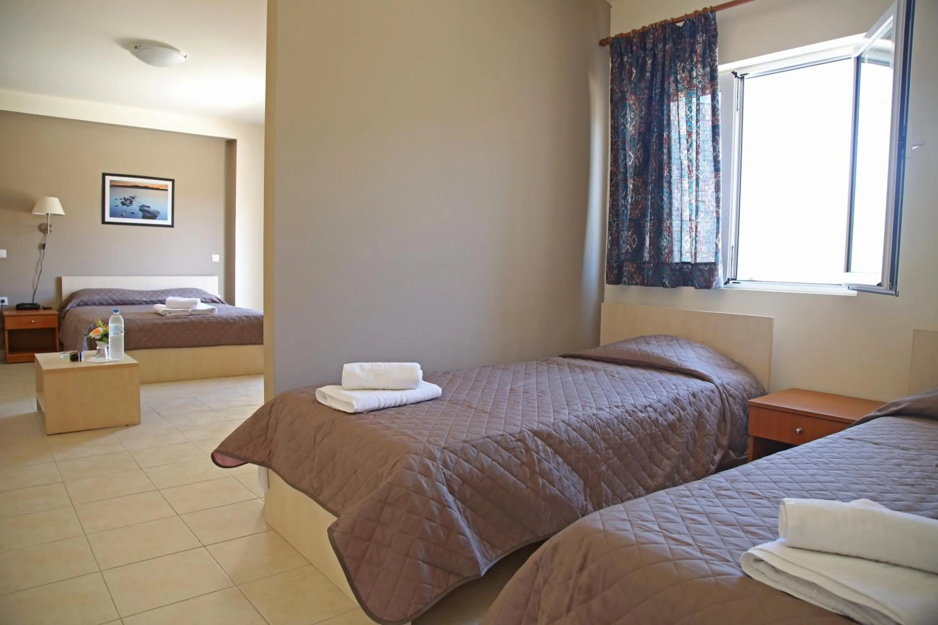 Bed in Hotel Sea Breeze