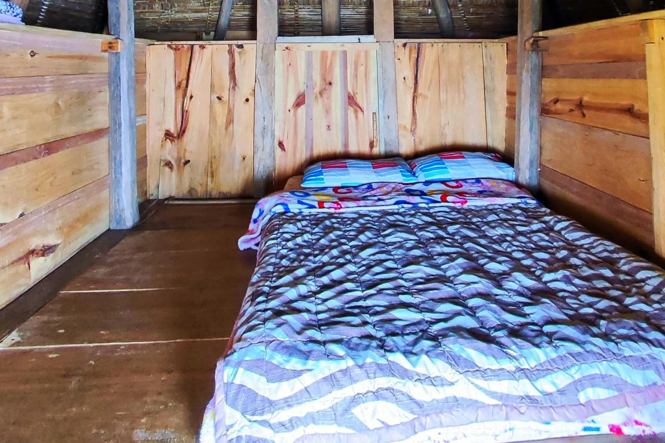 Bed in Hiwang Native House Inn & Viewdeck