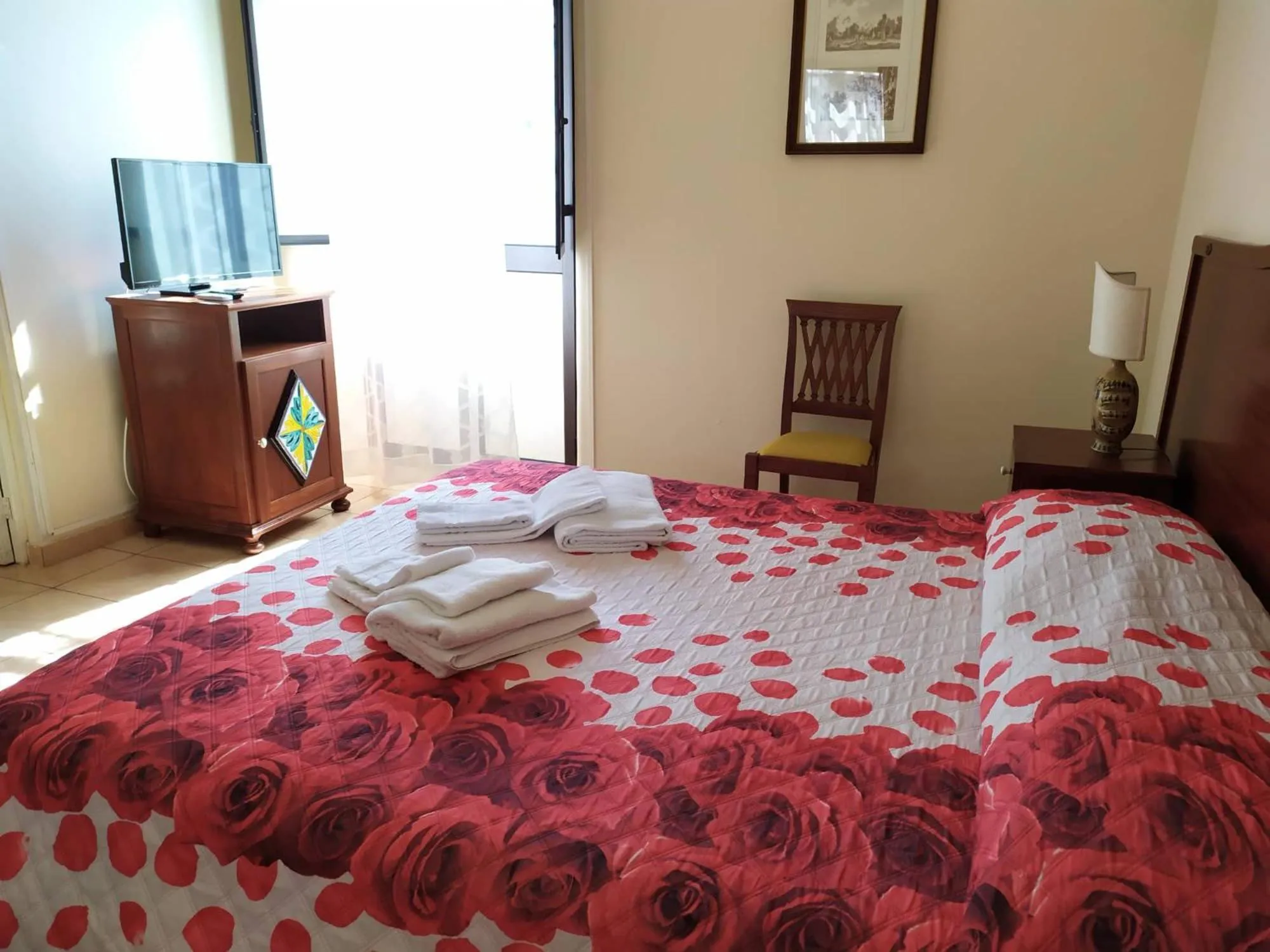 Bedroom in I Cappuccini Rooms