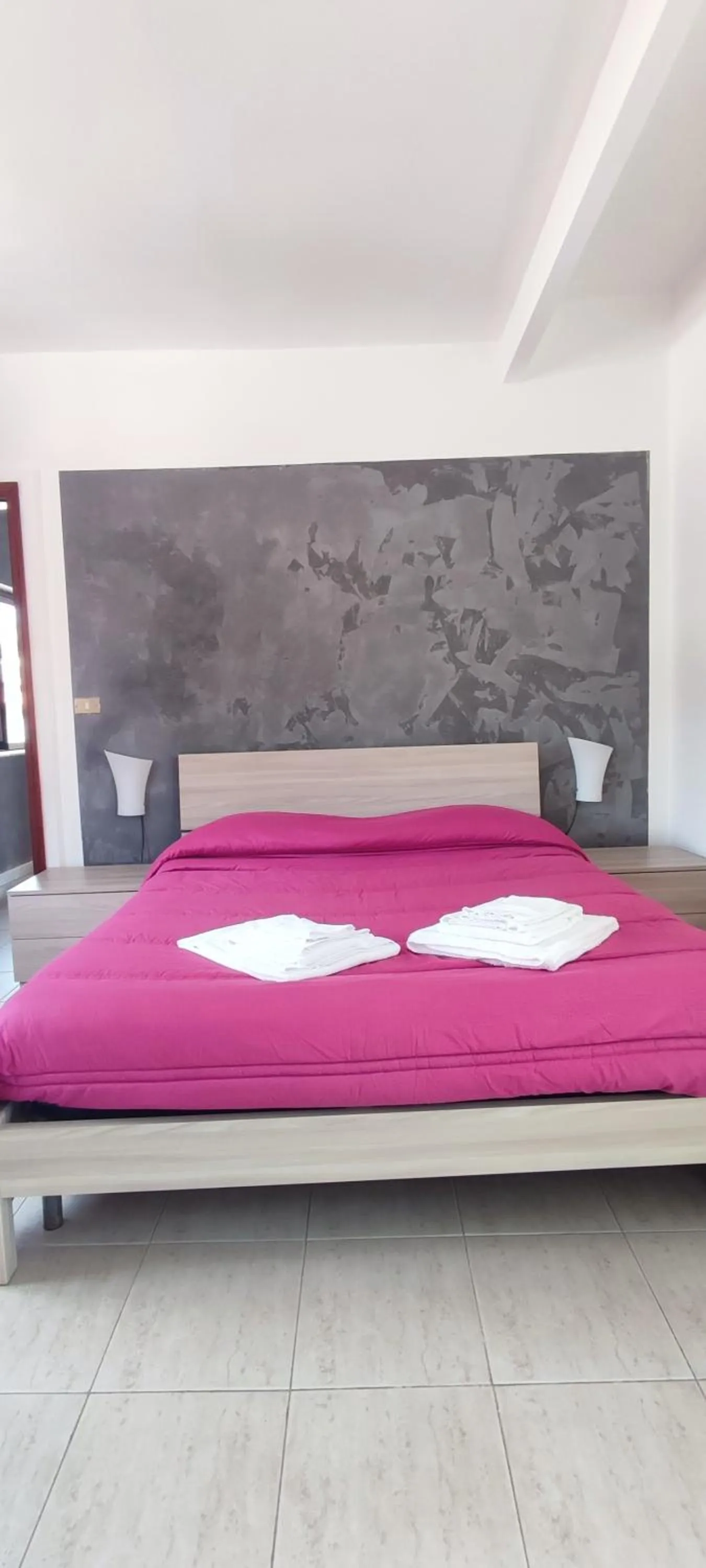 Bedroom in I Cappuccini Rooms