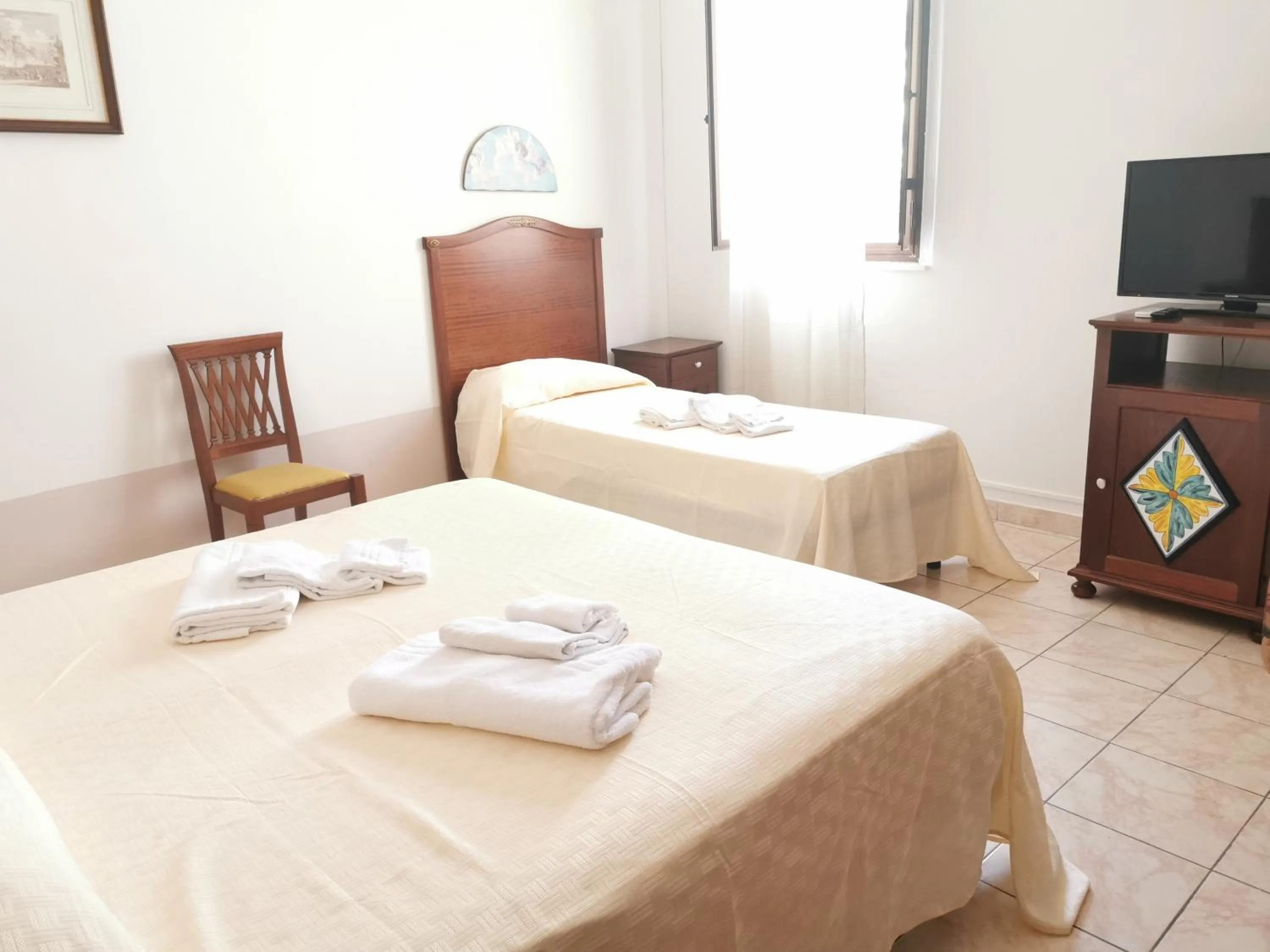 Bedroom in I Cappuccini Rooms