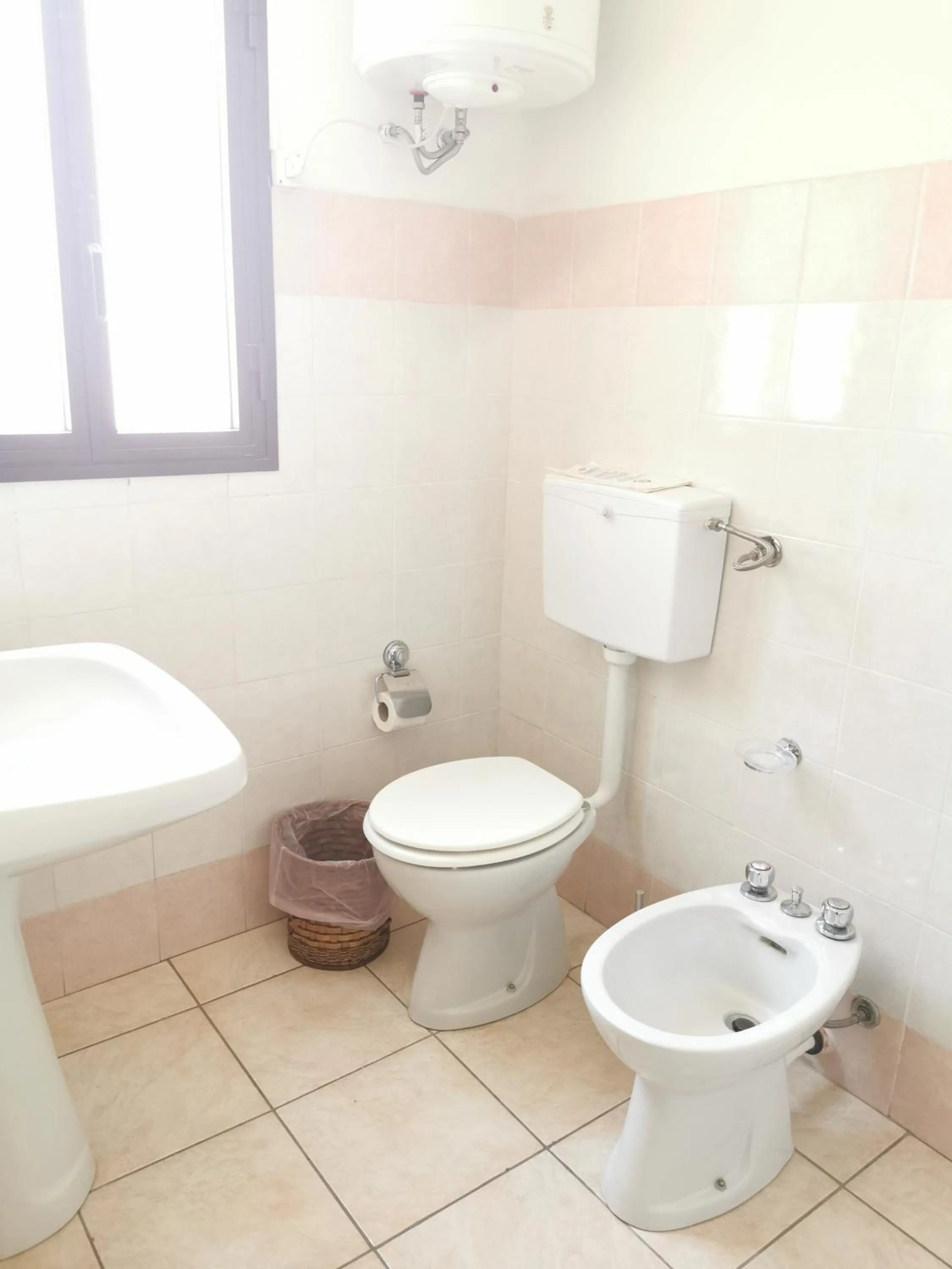 Bathroom in I Cappuccini Rooms