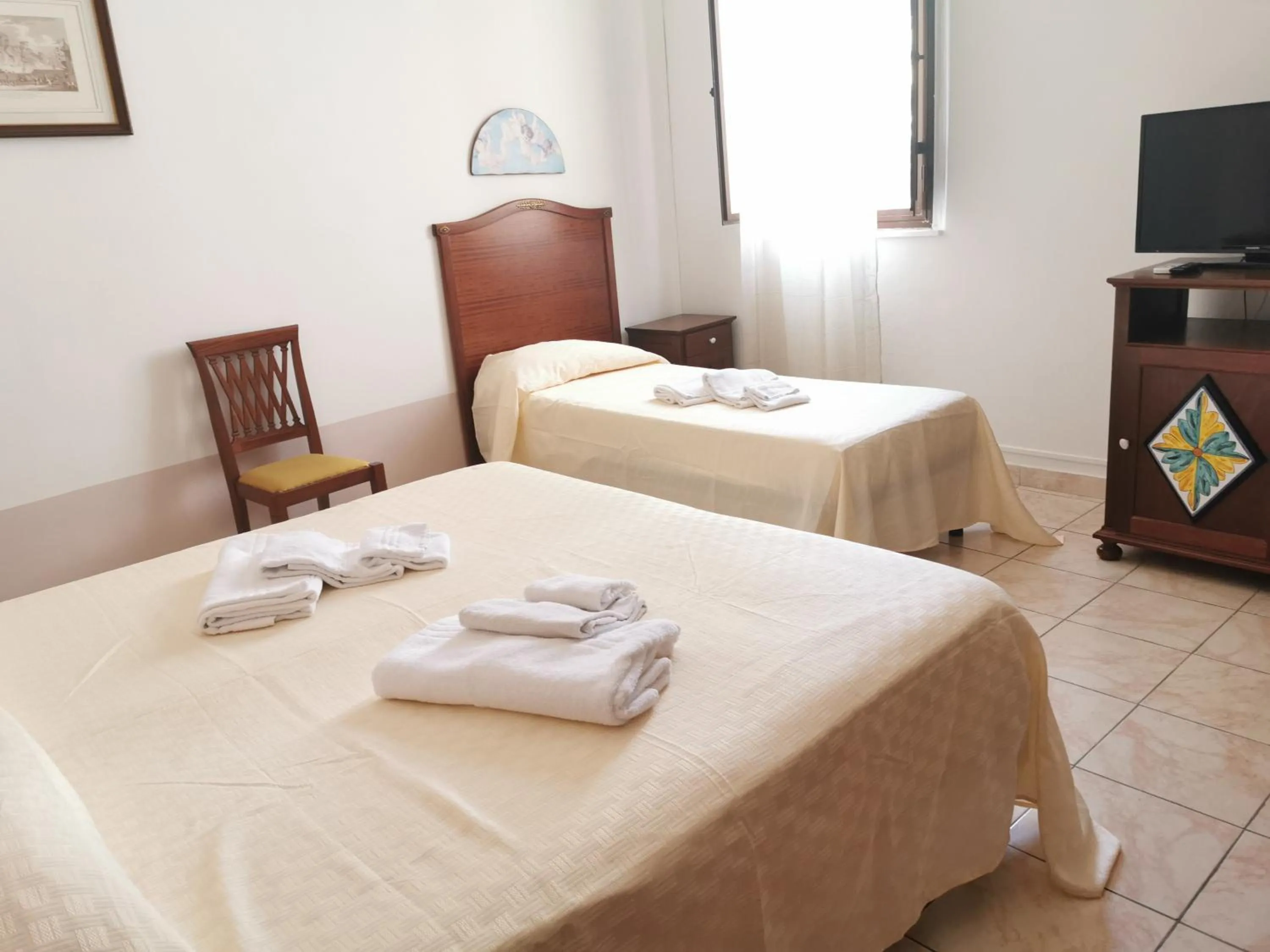 Bedroom in I Cappuccini Rooms