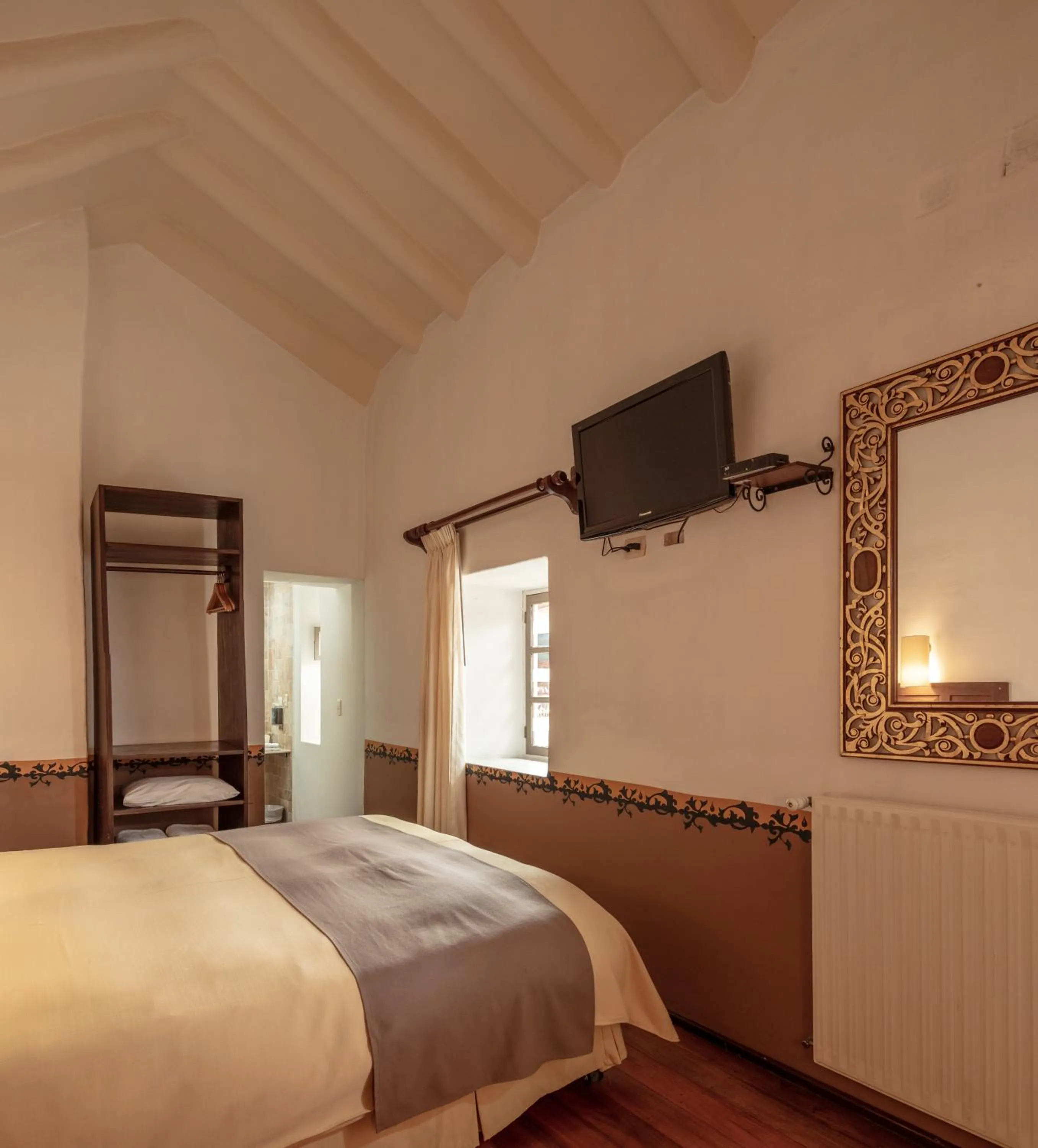 Bed in Tambo del Arriero Hotel Boutique