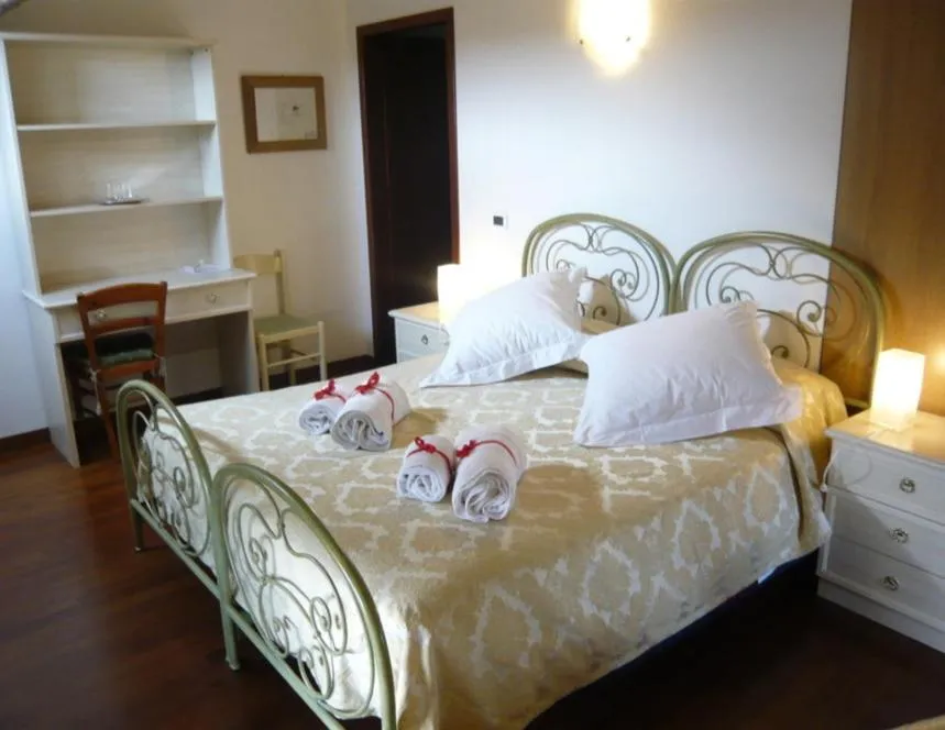 Bedroom, Bed in Villa Gabriella B&B - Apartments