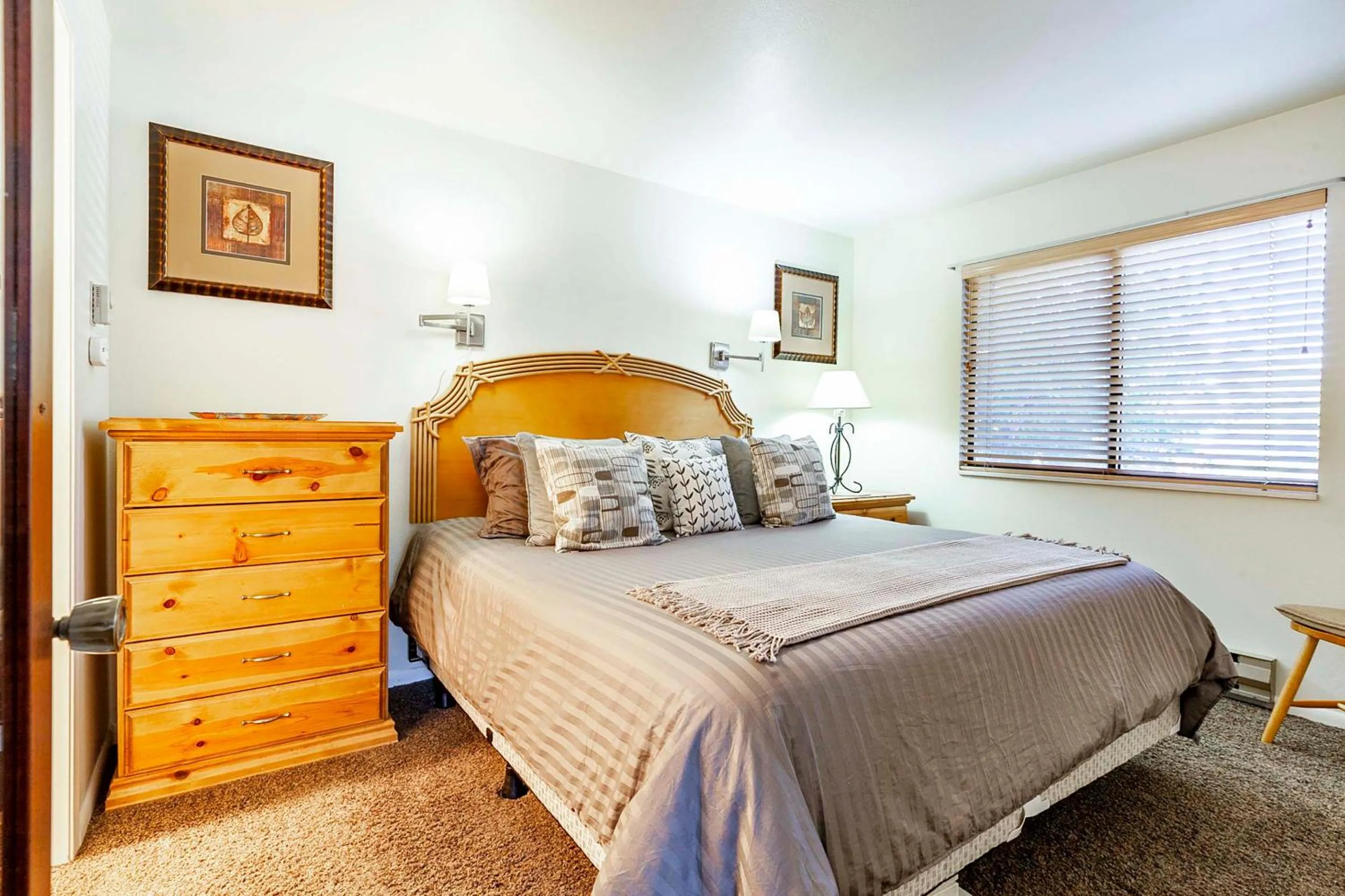 Bed in Red Pine Condominiums by All Seasons Resort Lodging