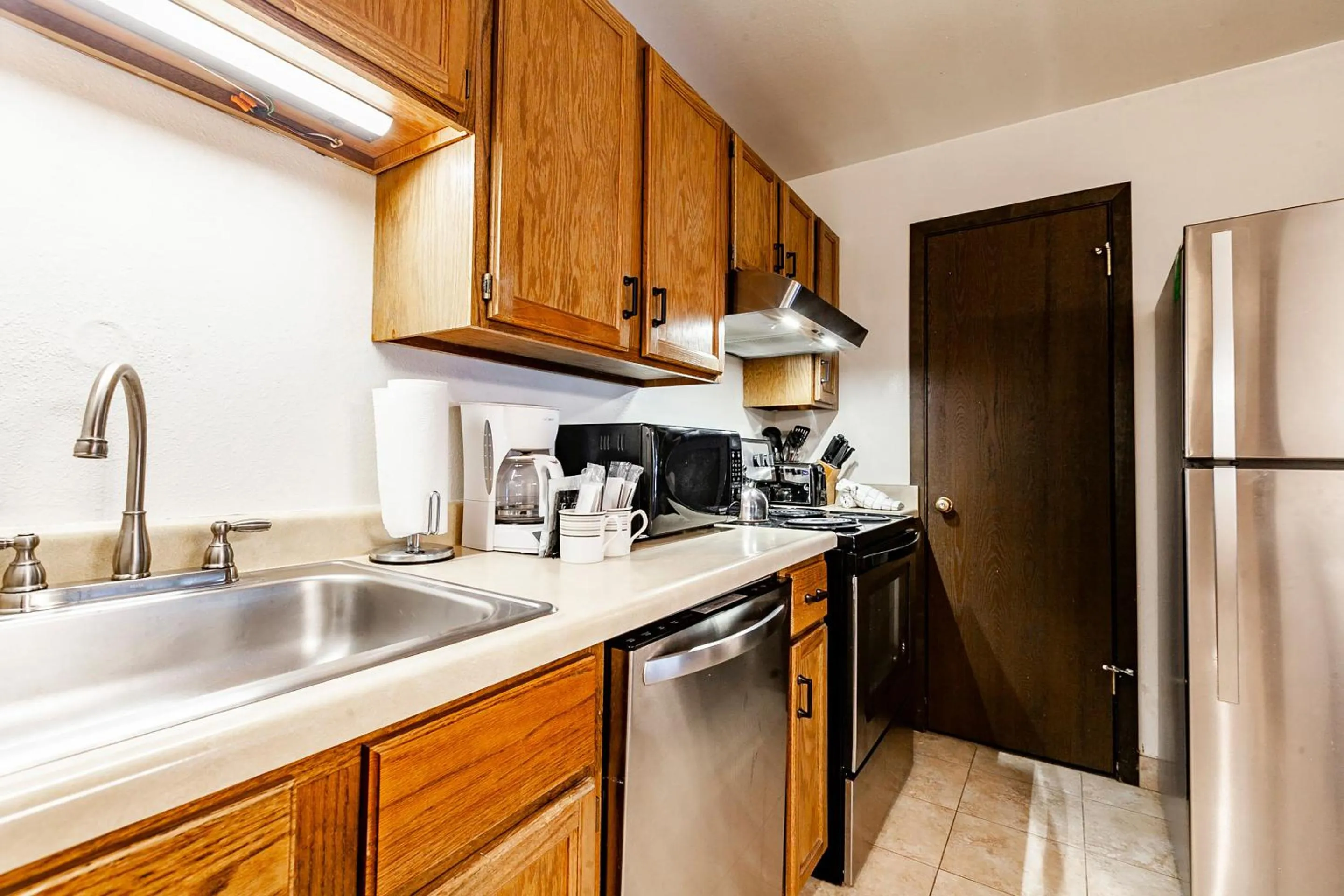 Kitchen or kitchenette in Red Pine Condominiums by All Seasons Resort Lodging