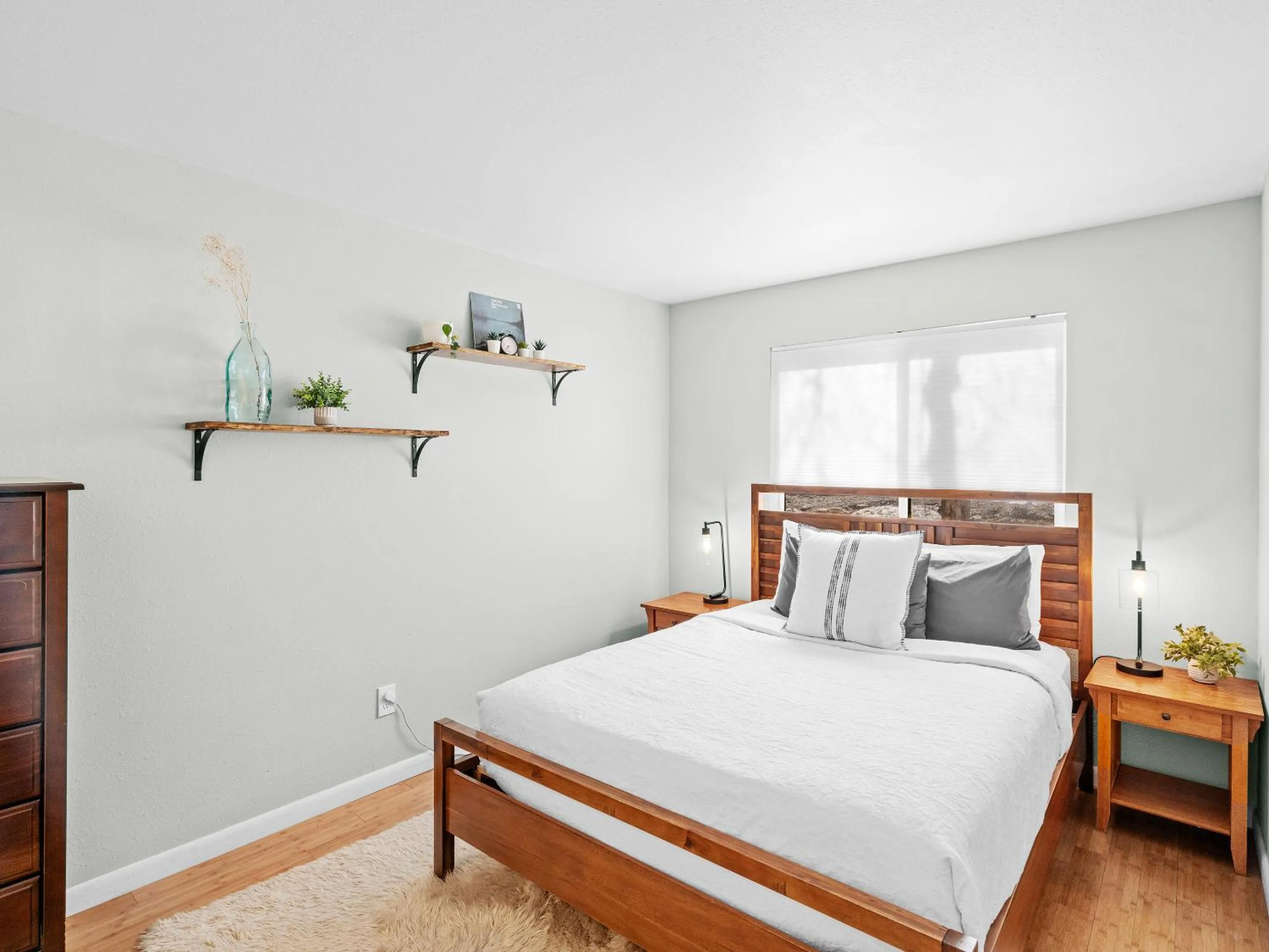 Bed in Red Pine Condominiums by All Seasons Resort Lodging