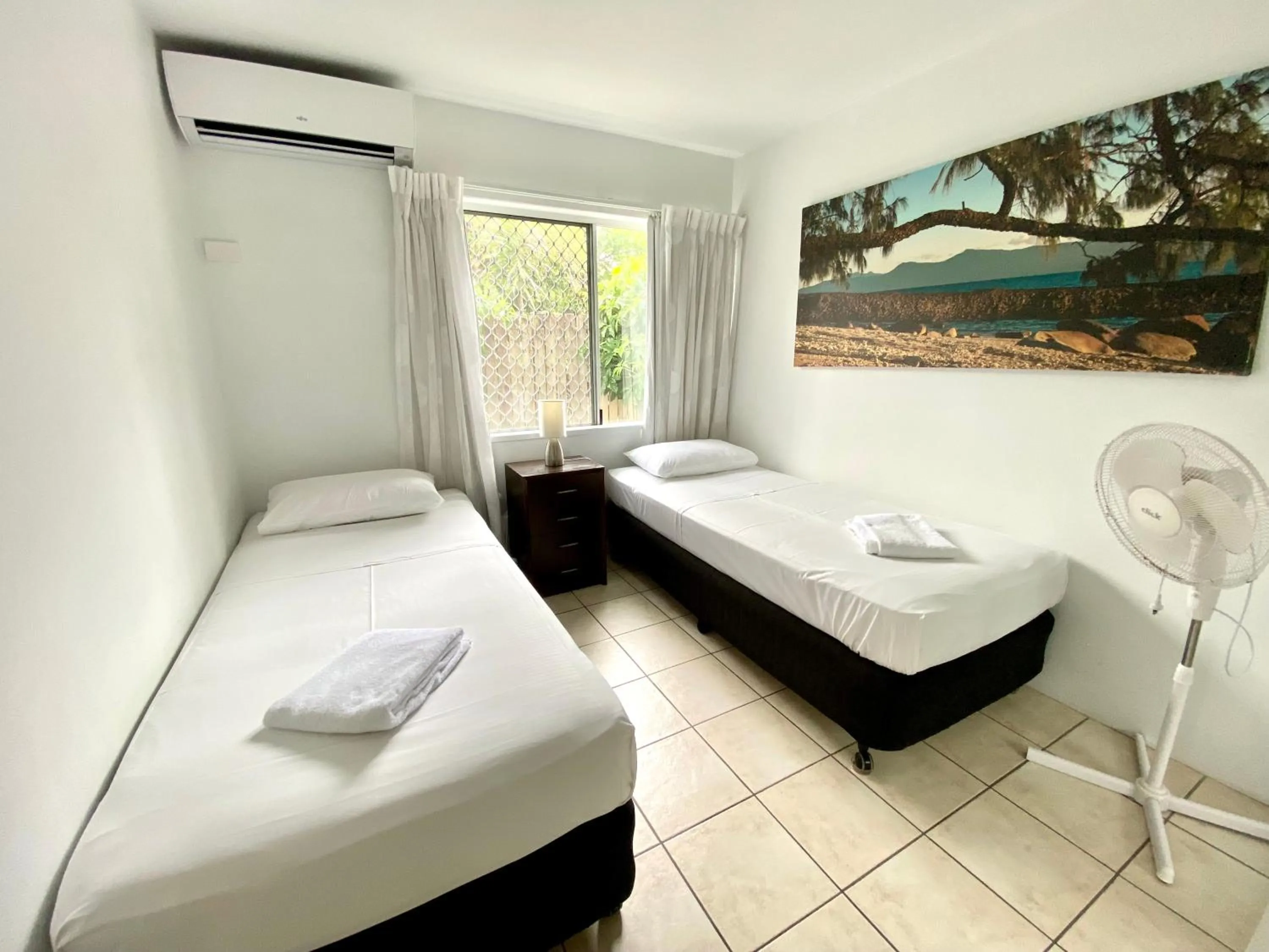 Bed in Reef Gateway Apartments