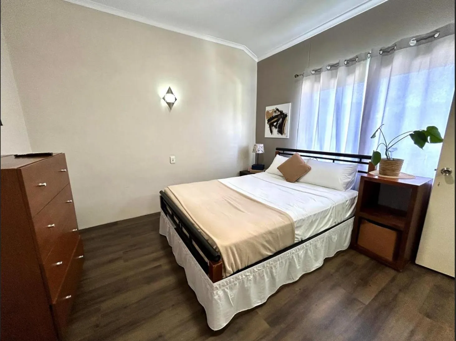 Bed in Reef Gateway Apartments