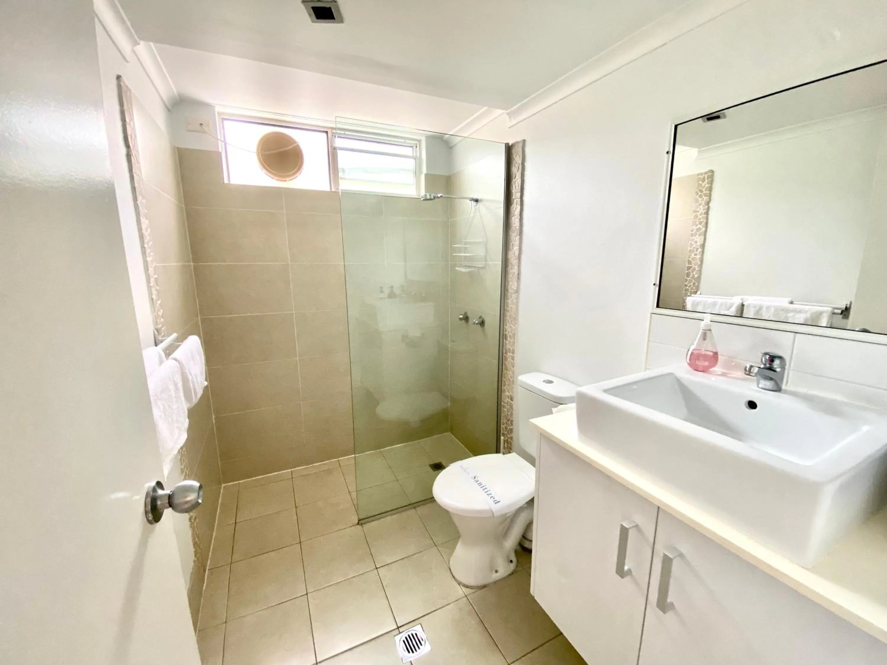 Shower in Reef Gateway Apartments