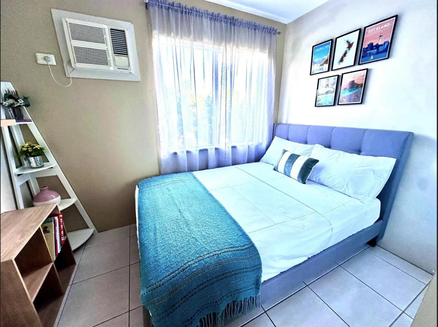 Bed in Reef Gateway Apartments