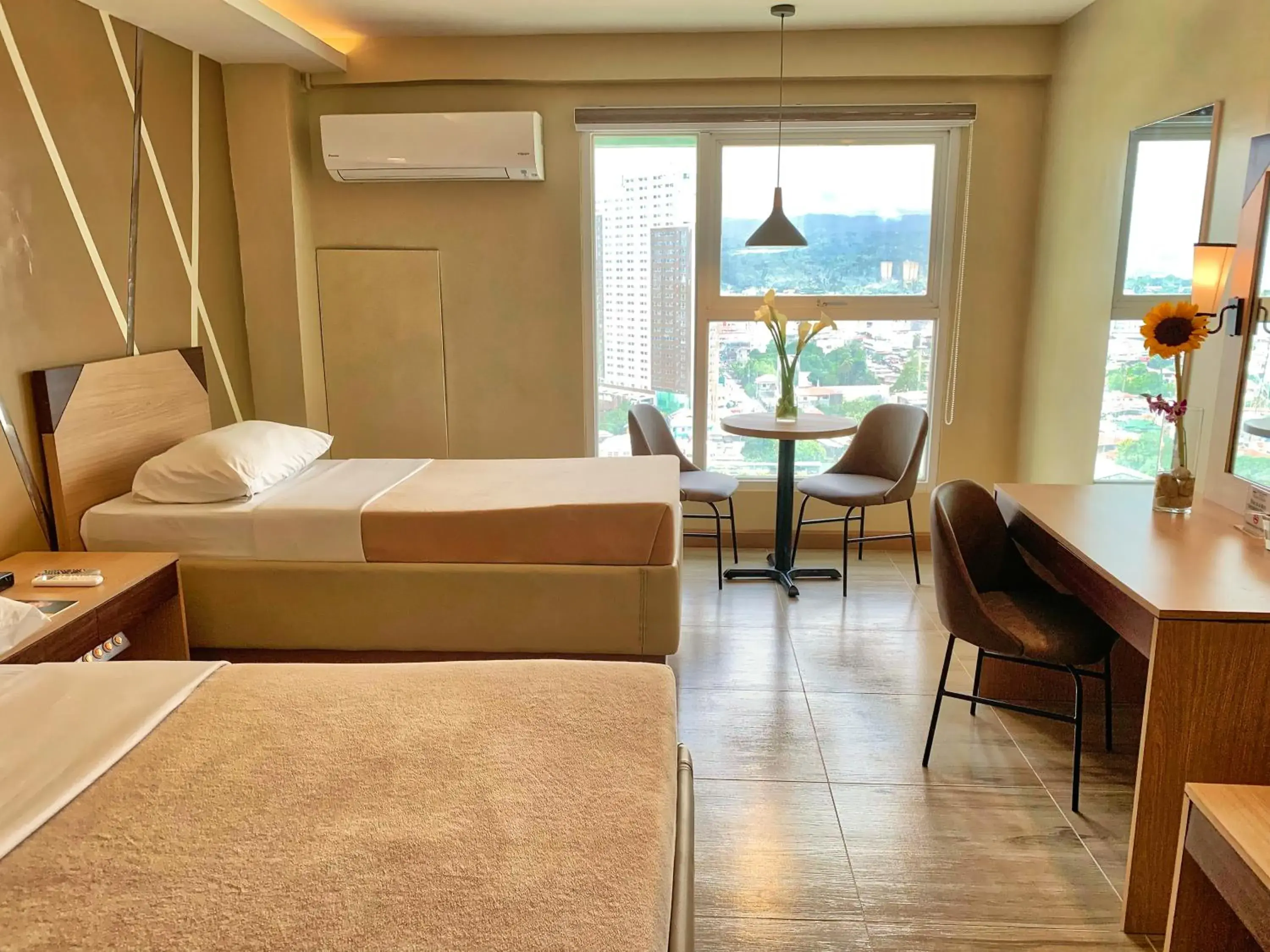 Photo of the whole room, Bed in New Dawn Hotel Plus Photo of the whole room, Bed in New Dawn Hotel Plus