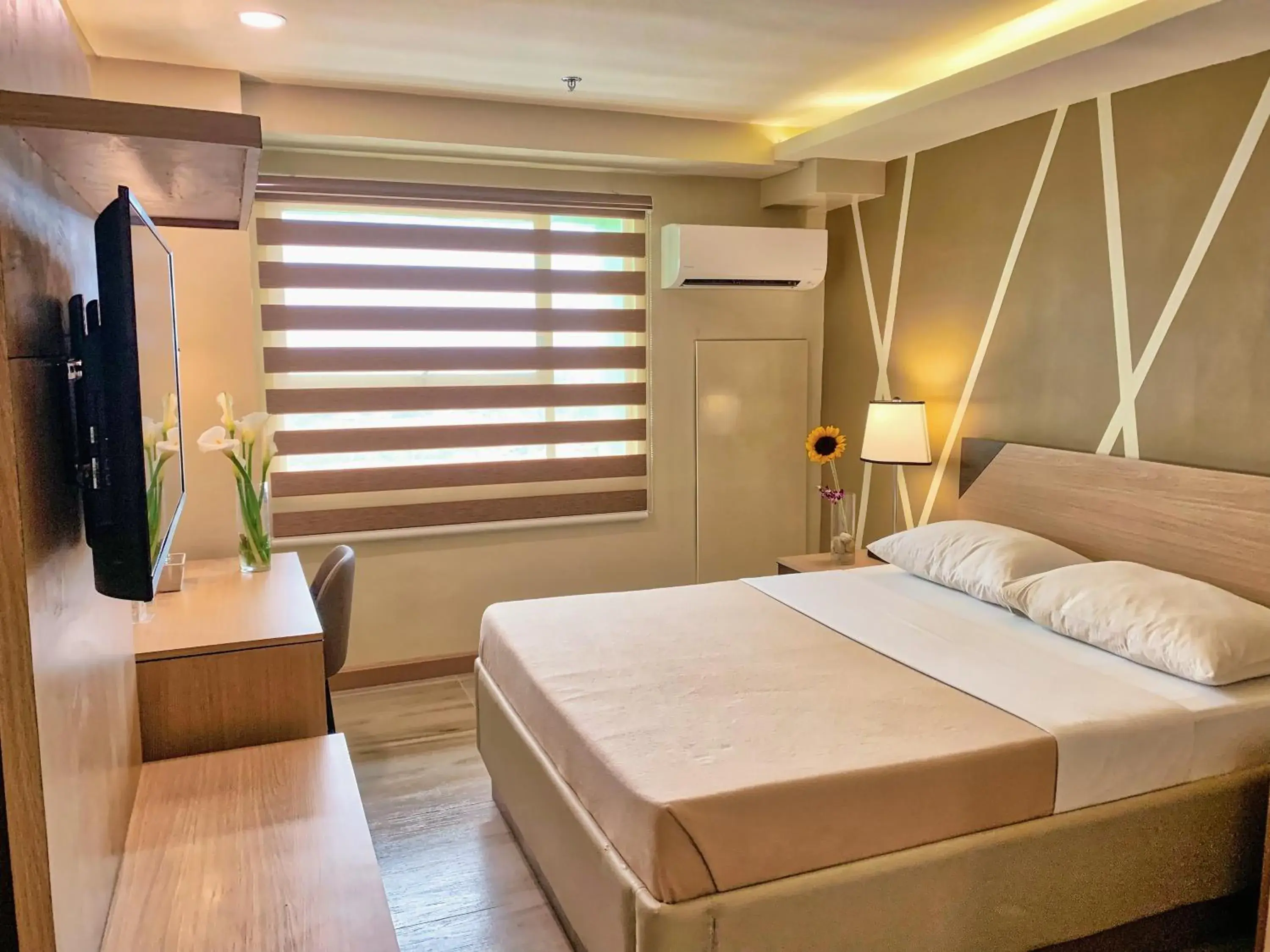 Photo of the whole room in New Dawn Hotel Plus Photo of the whole room in New Dawn Hotel Plus