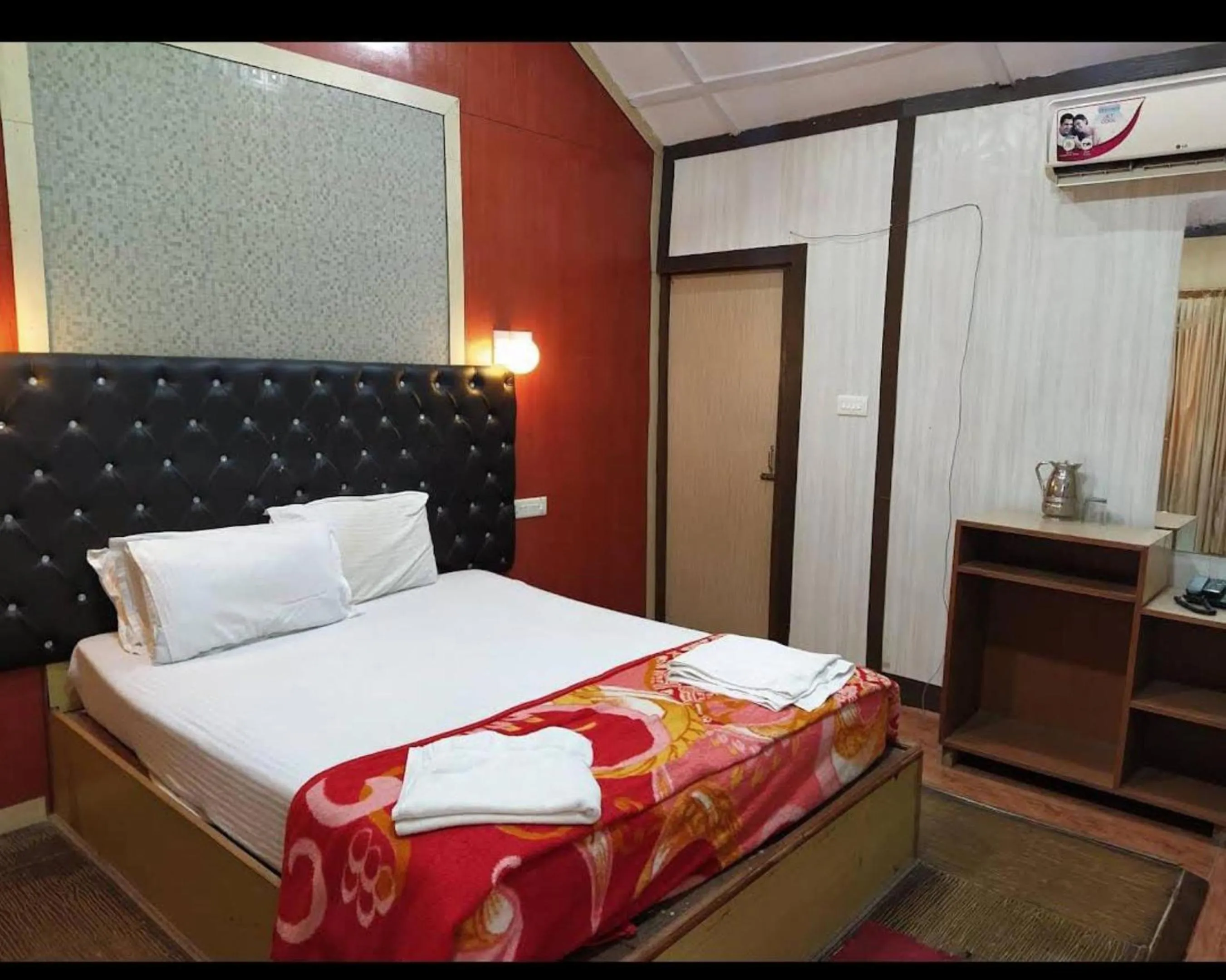 Bed in Gold India Beach Resort