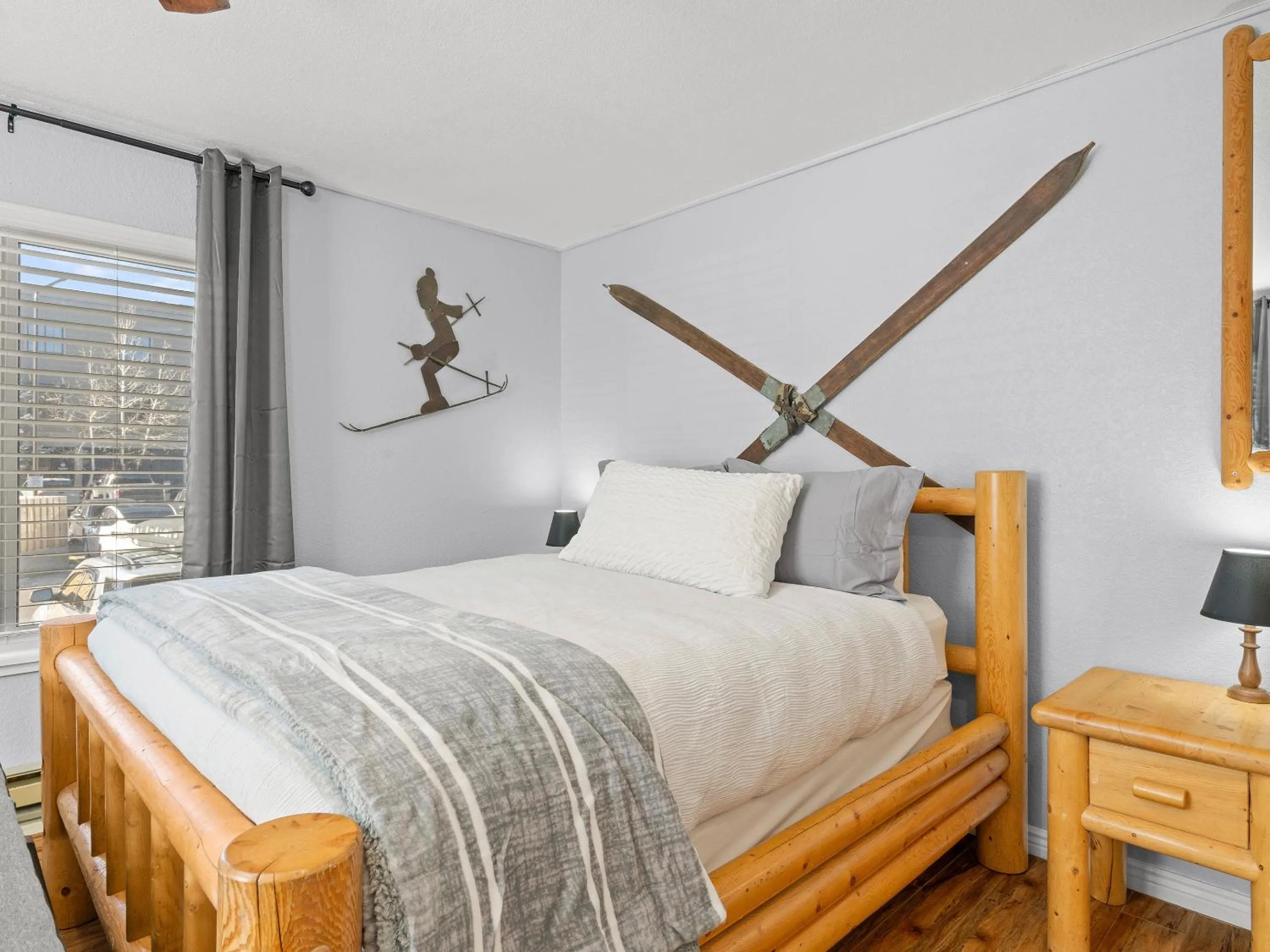 Bed in Carriage House Condominiums by All Seasons Resort Lodging