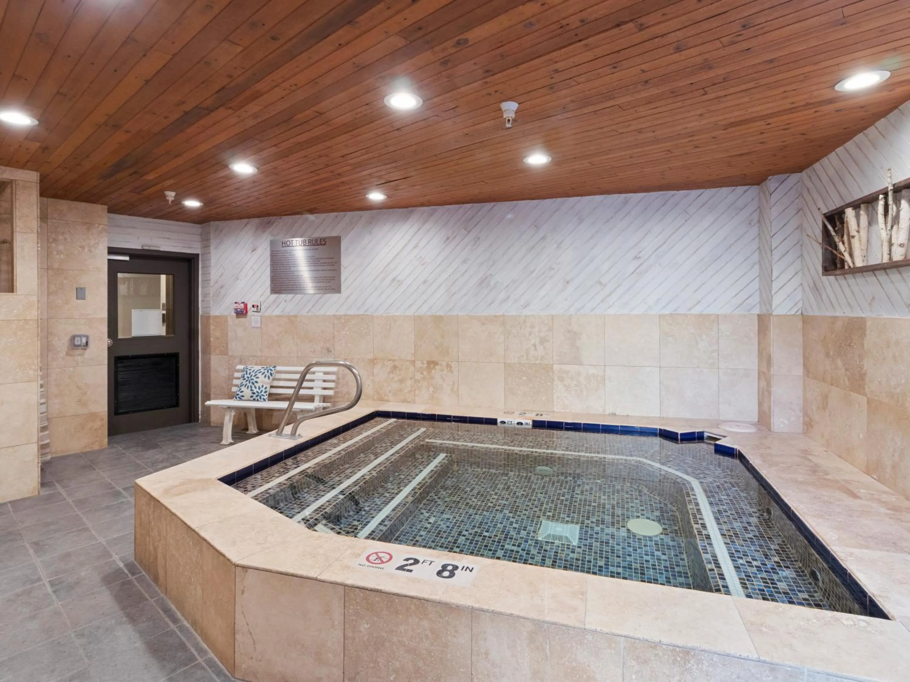 Hot Tub in Carriage House Condominiums by All Seasons Resort Lodging