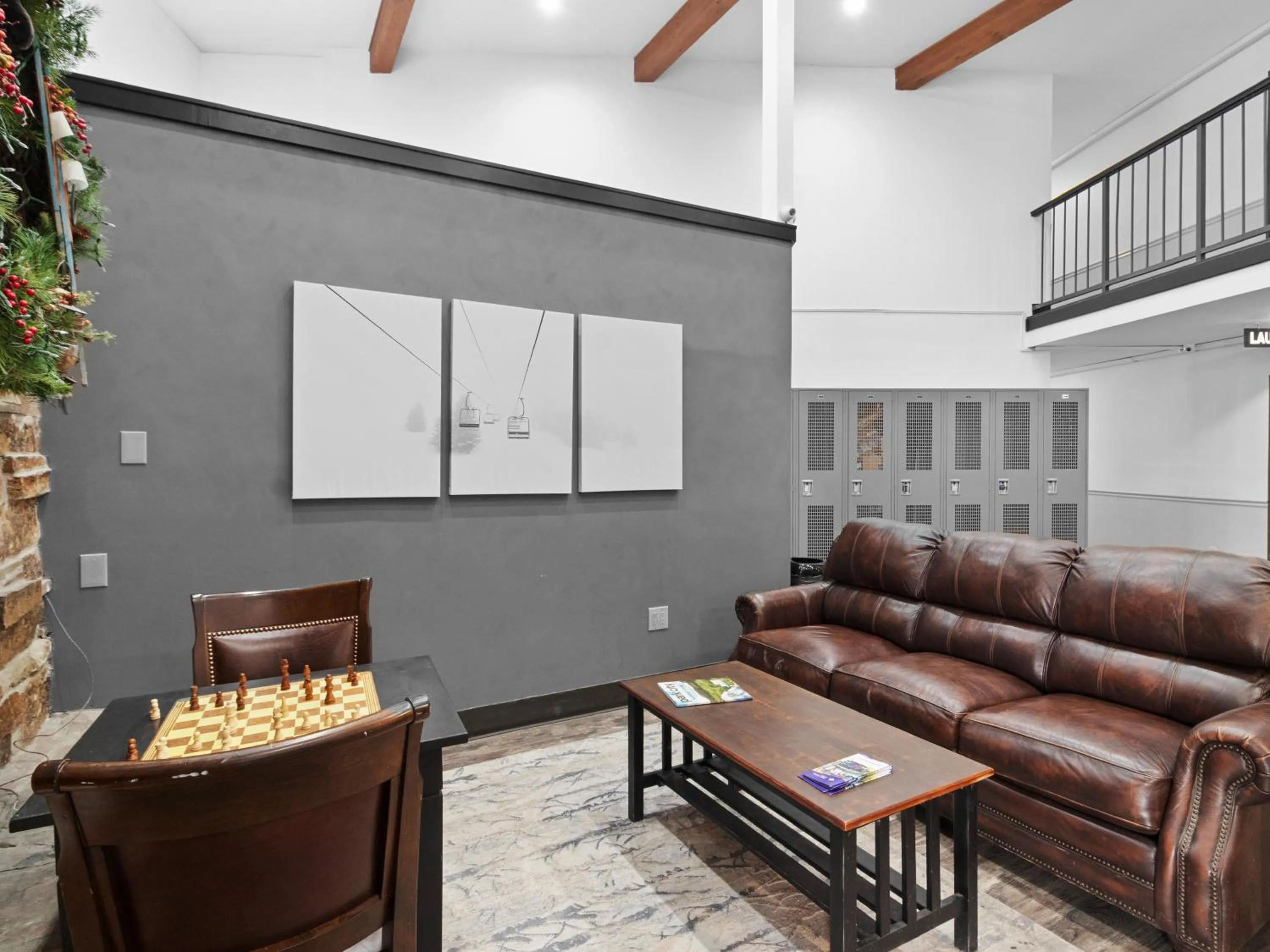Communal lounge/ TV room in Carriage House Condominiums by All Seasons Resort Lodging