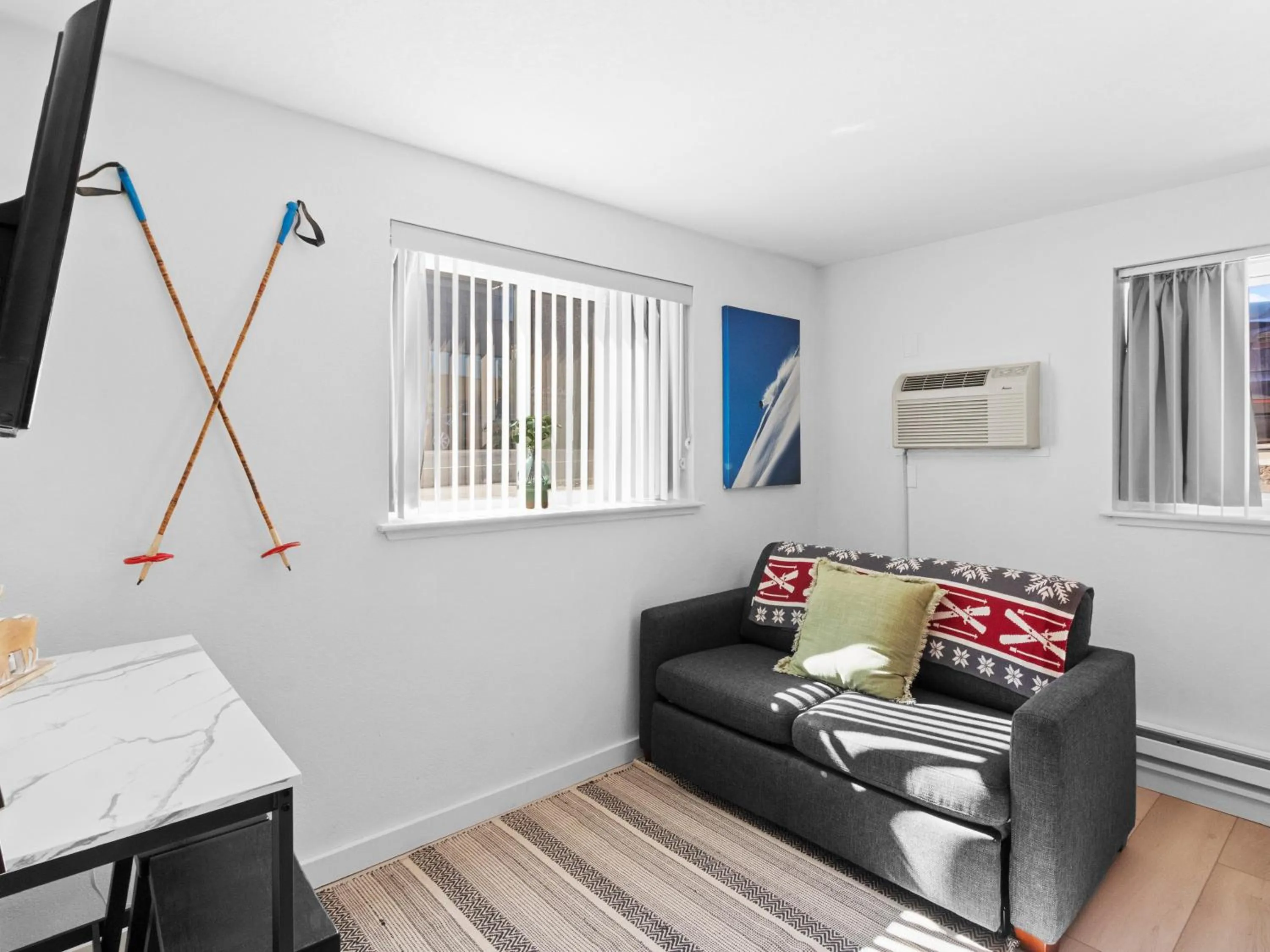 Living room in Carriage House Condominiums by All Seasons Resort Lodging