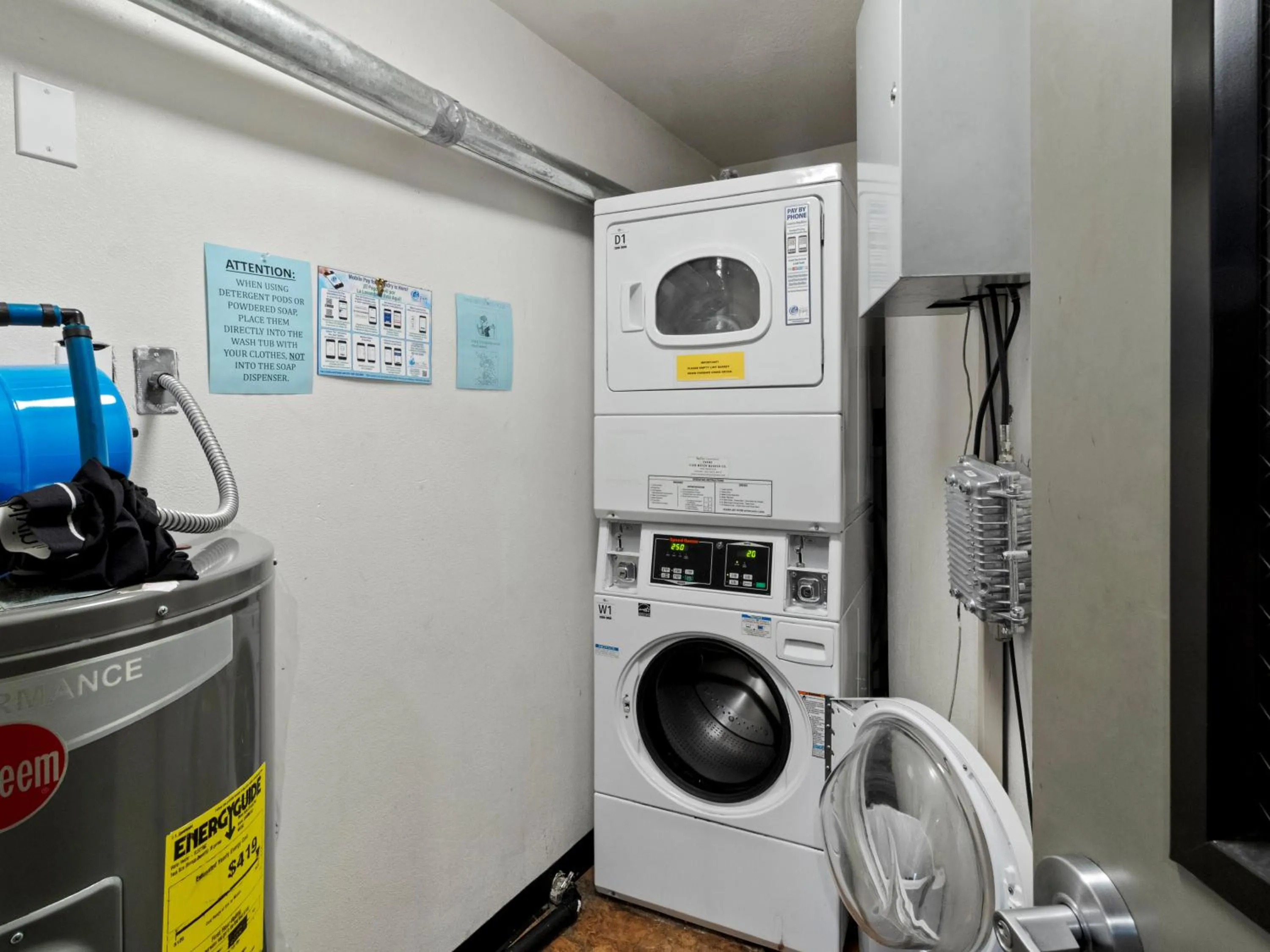 washing machine in Carriage House Condominiums by All Seasons Resort Lodging