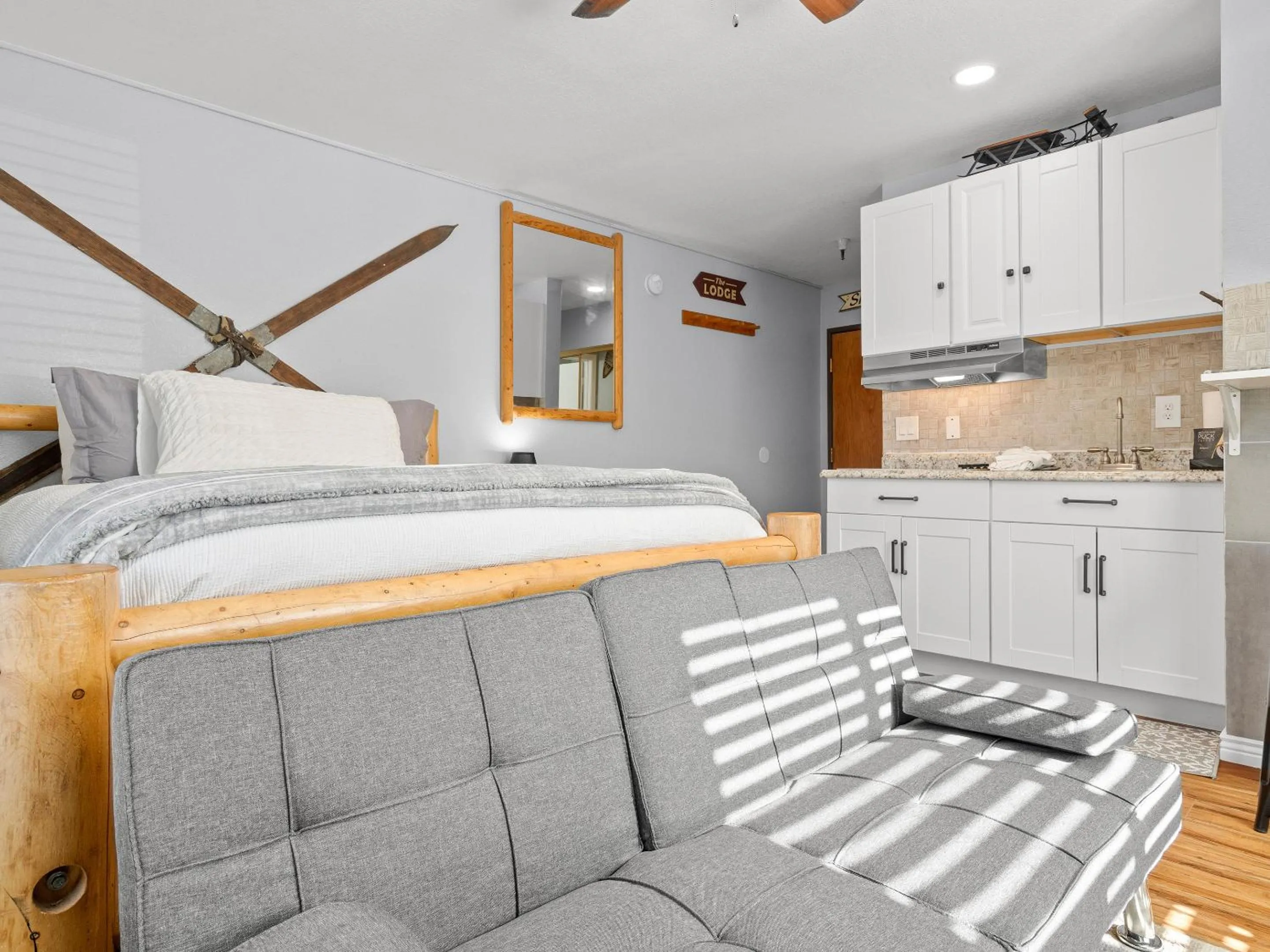 Bed in Carriage House Condominiums by All Seasons Resort Lodging