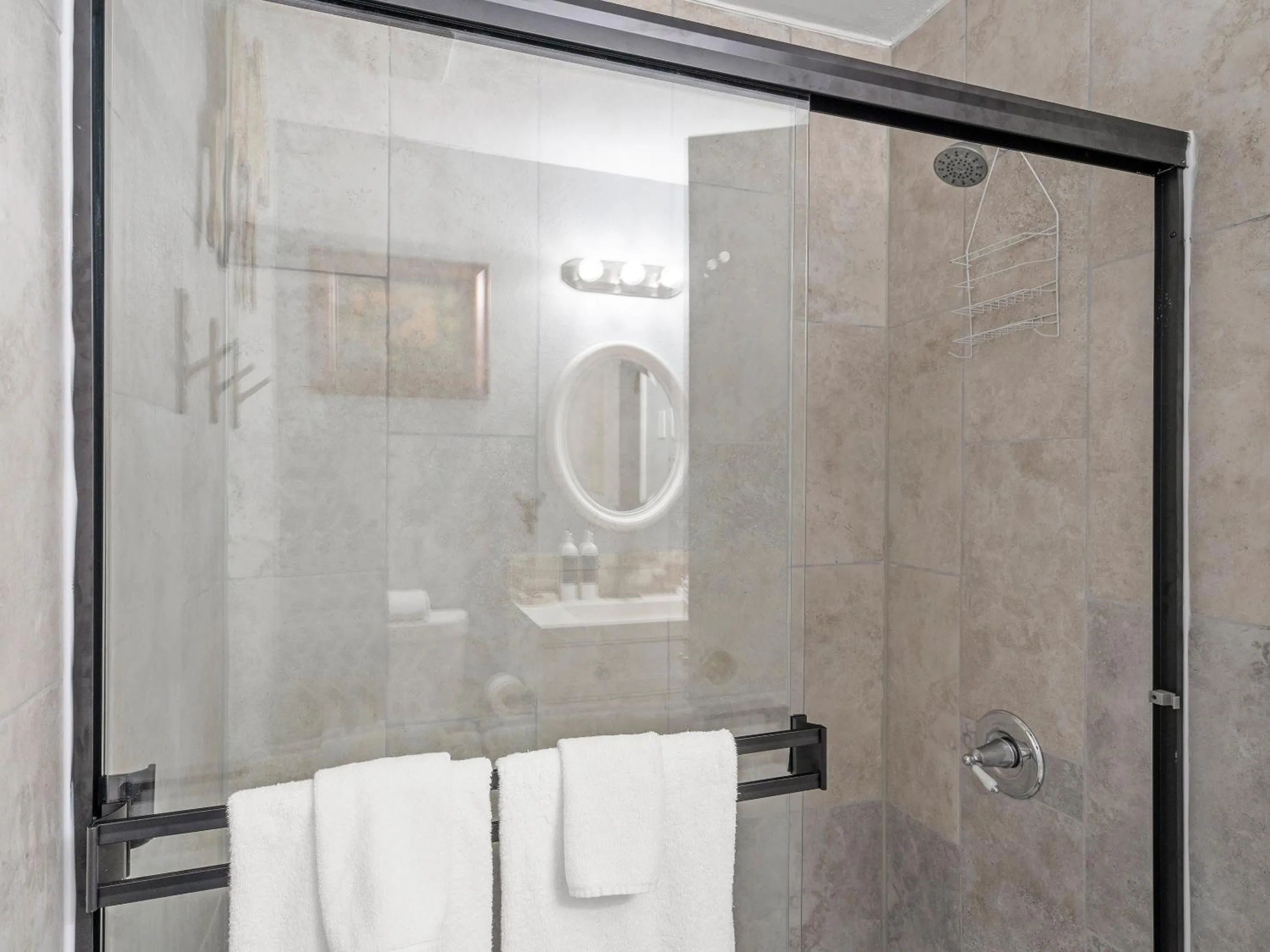 Bathroom in Carriage House Condominiums by All Seasons Resort Lodging