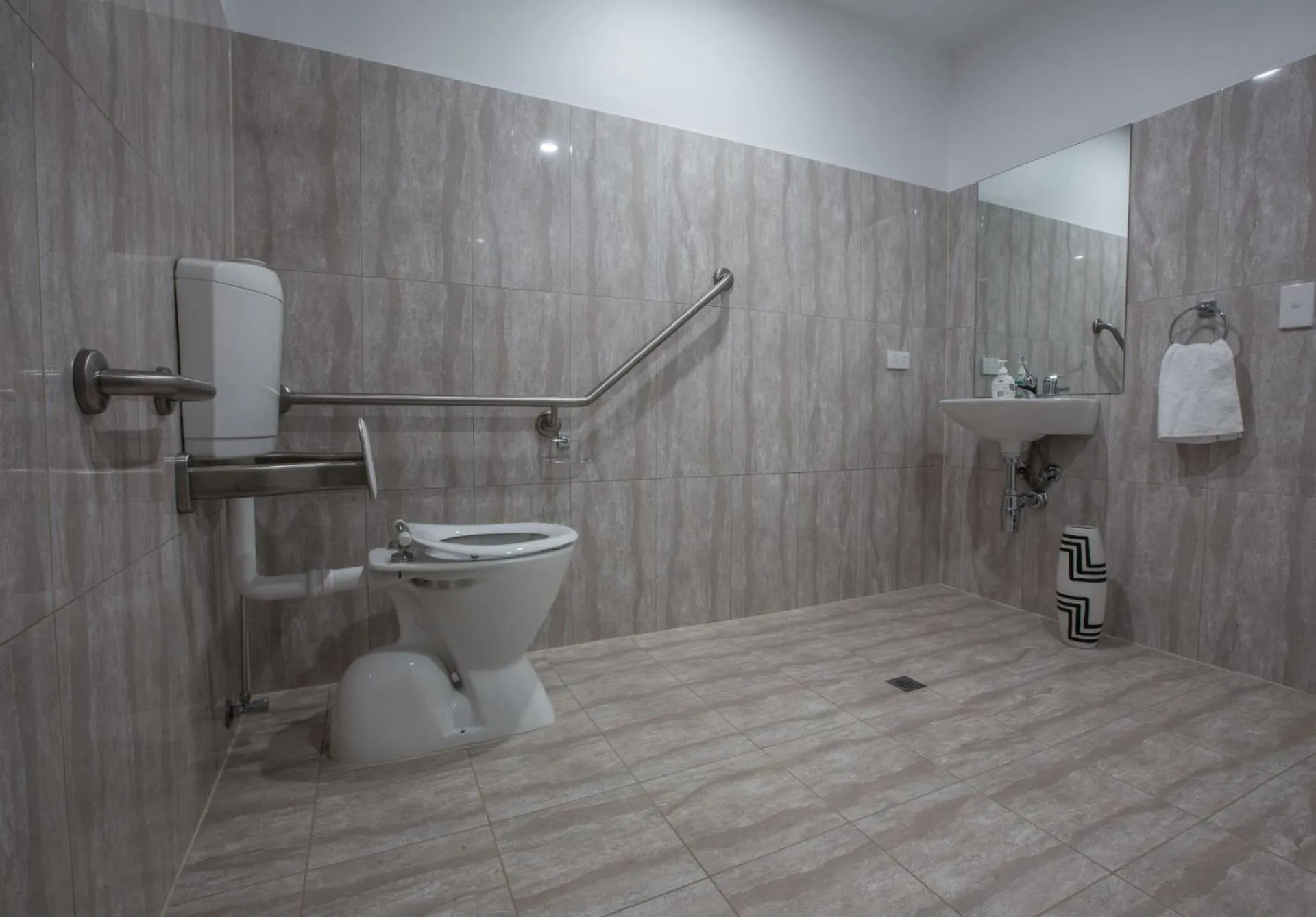 Toilet in The Palms Apartments