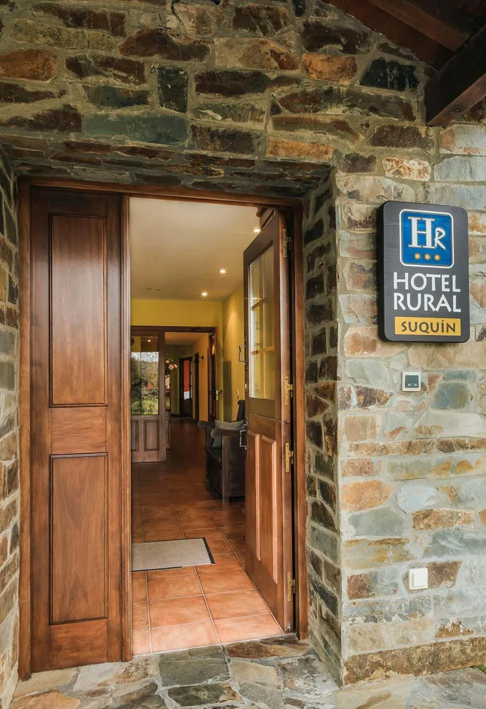 Property logo or sign in Hotel Rural Suquin