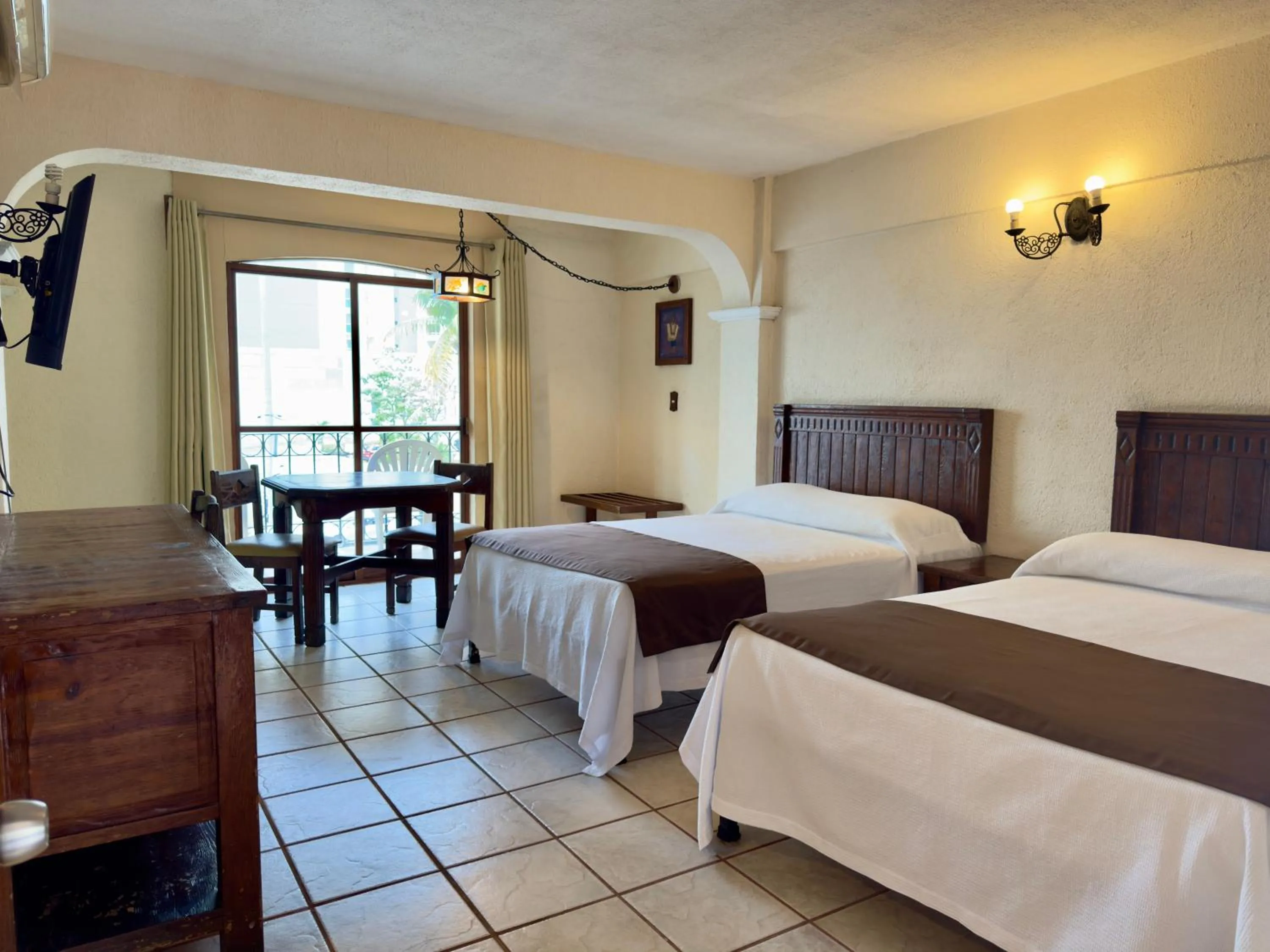 Bed in Hotel Hacienda María Eugenia Acapulco