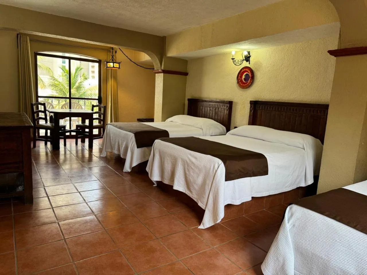 Bed in Hotel Hacienda María Eugenia Acapulco