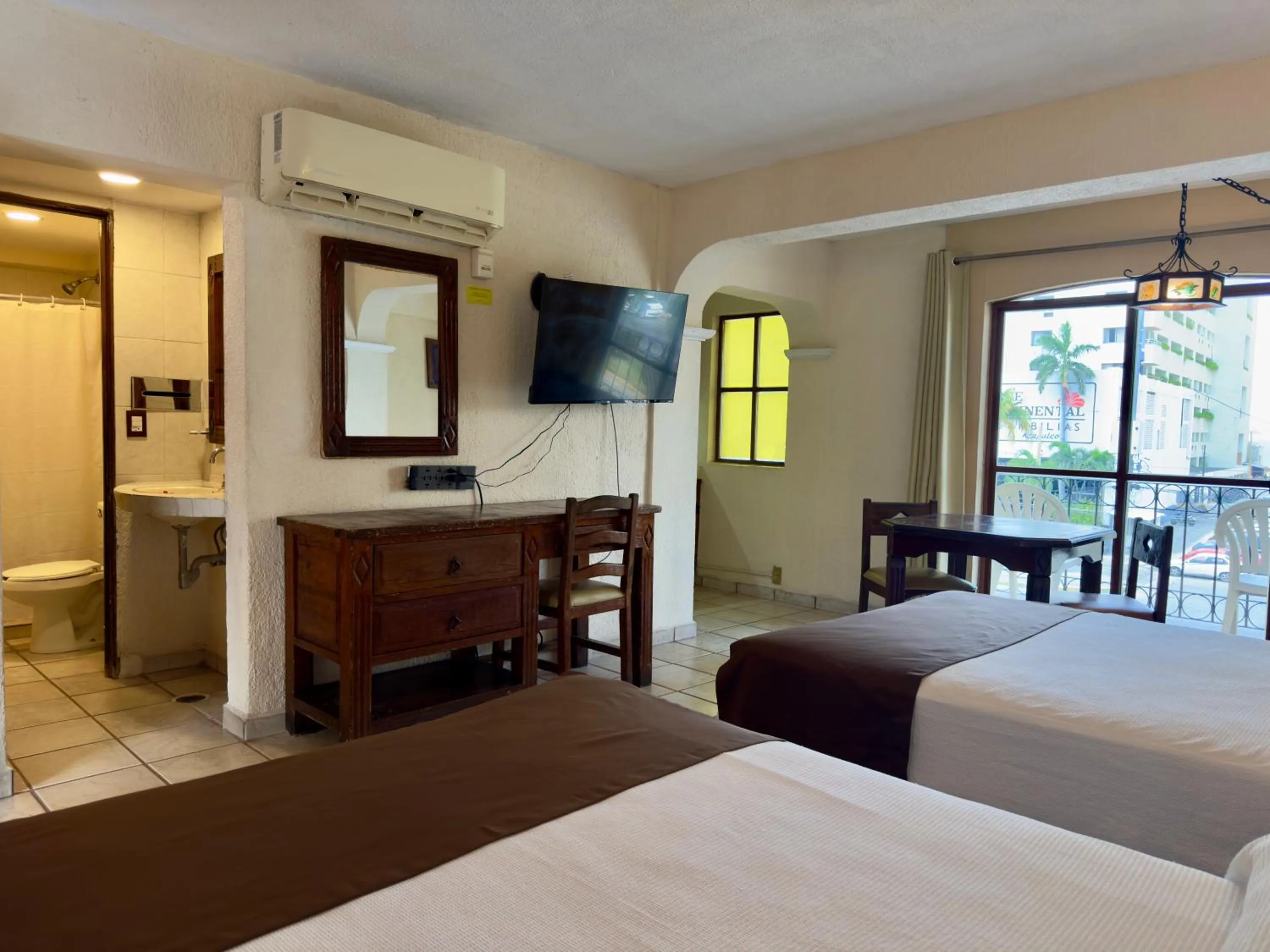 Bed in Hotel Hacienda María Eugenia Acapulco