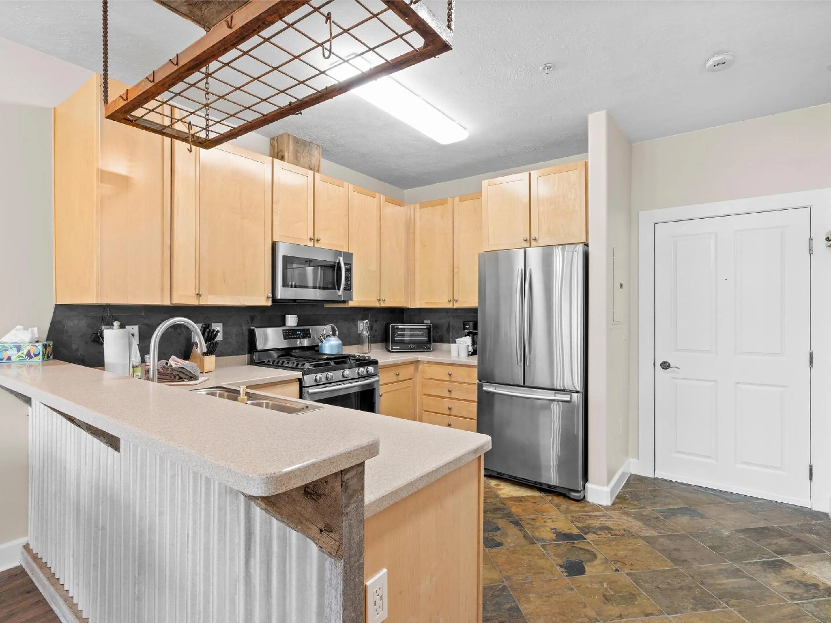 Kitchen or kitchenette in Crestview Condominiums by All Seasons Resort Lodging