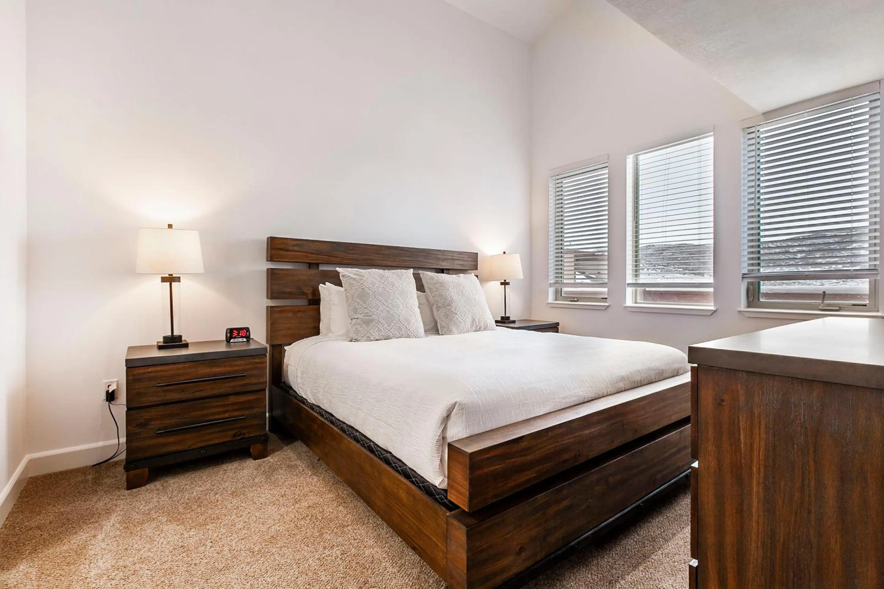Bed in Crestview Condominiums by All Seasons Resort Lodging