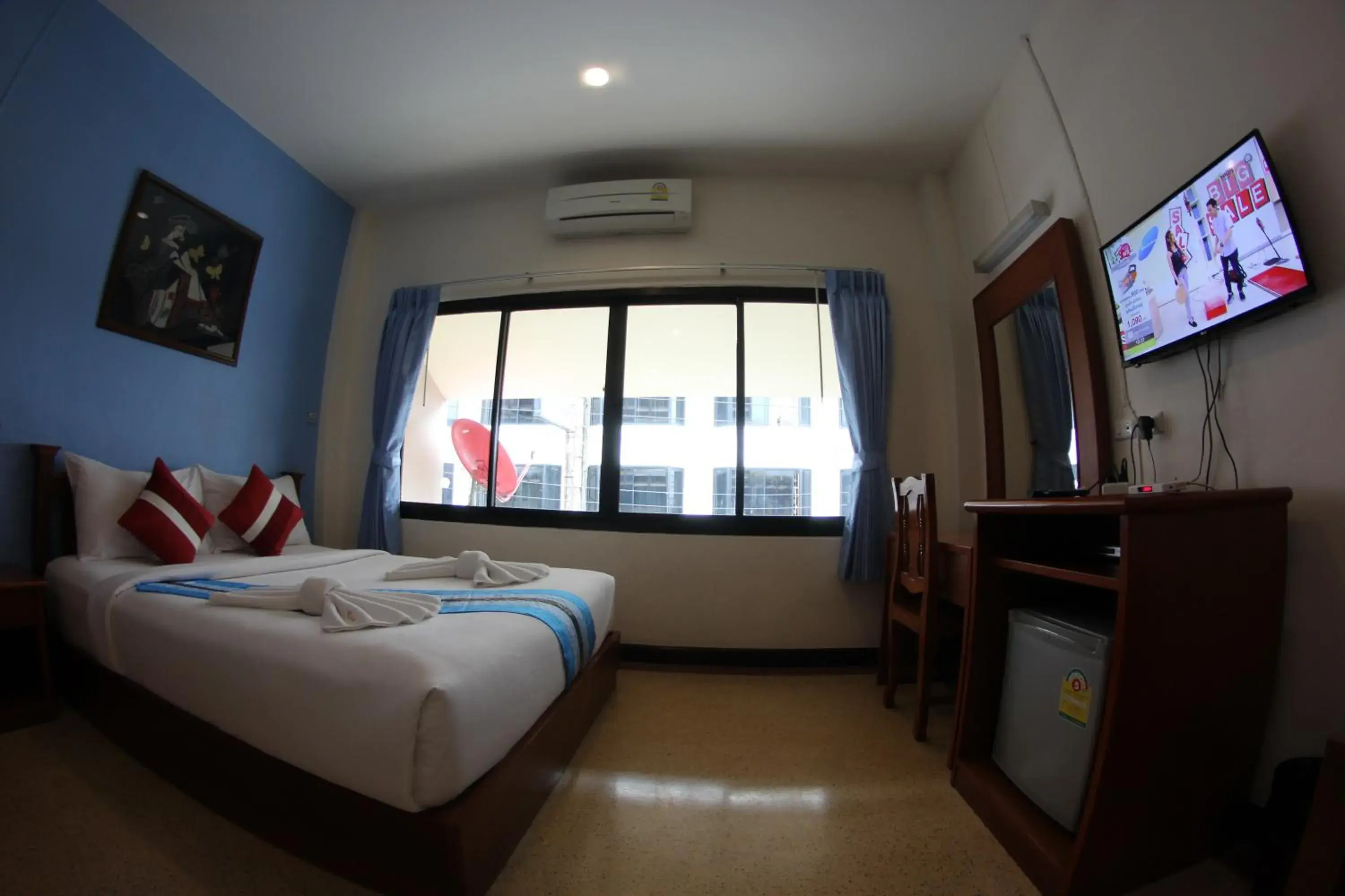 Communal lounge/ TV room, Bed in Myplace@Surat Hotel Communal lounge/ TV room, Bed in Myplace@Surat Hotel