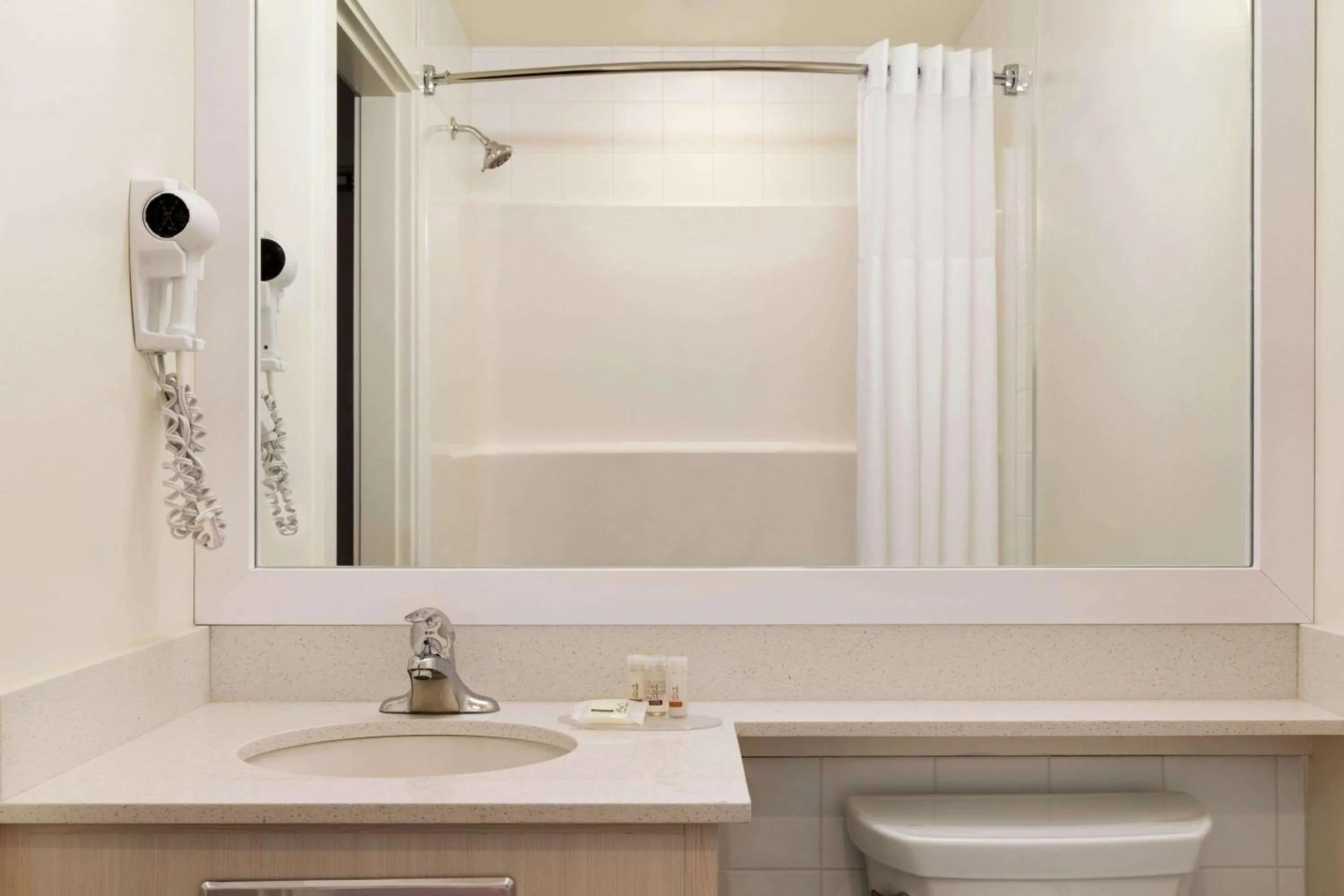 Bathroom in Days Inn by Wyndham 100 Mile House