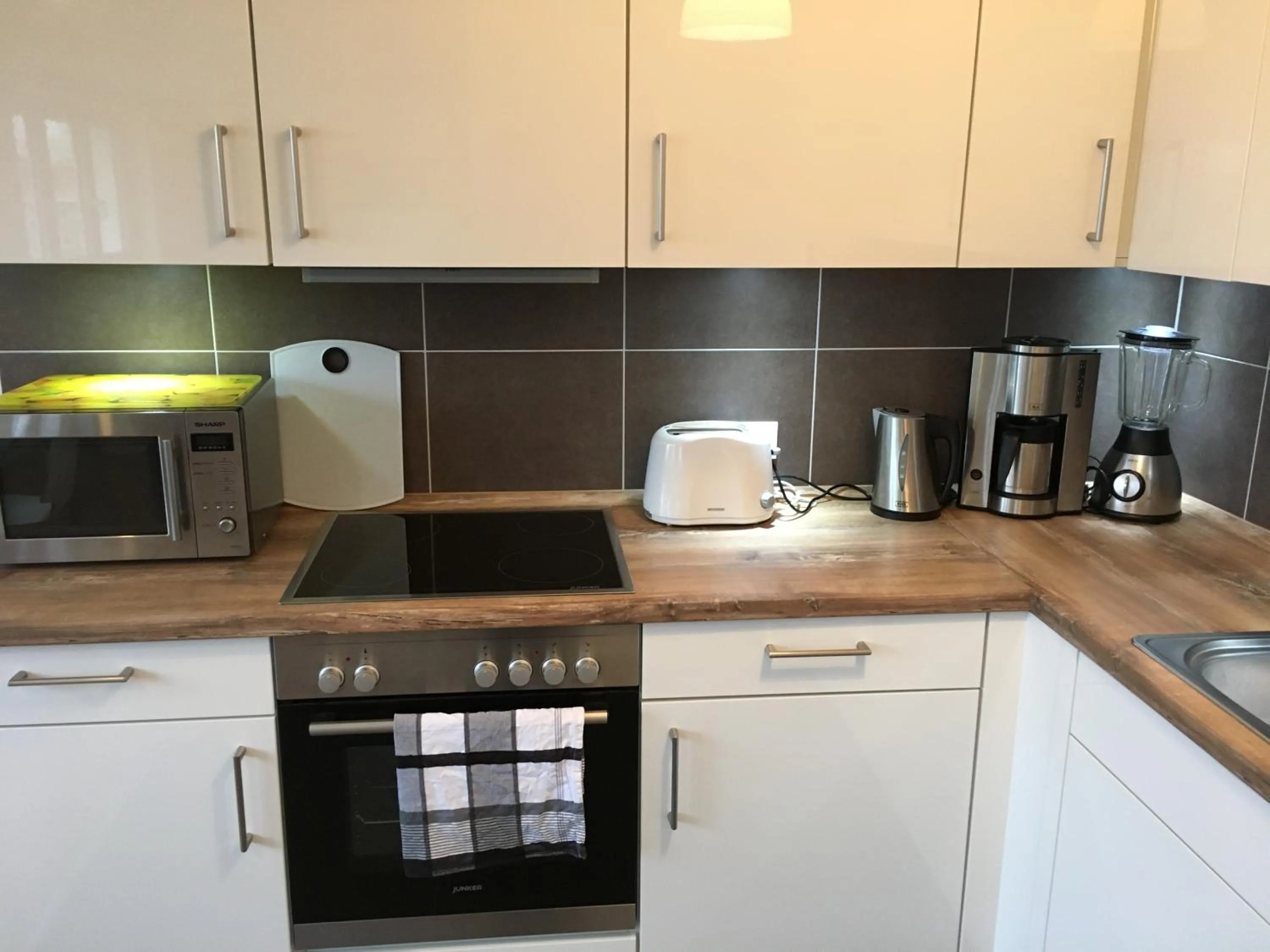 Kitchen or kitchenette in Arbio I Dehnhaide Apartments