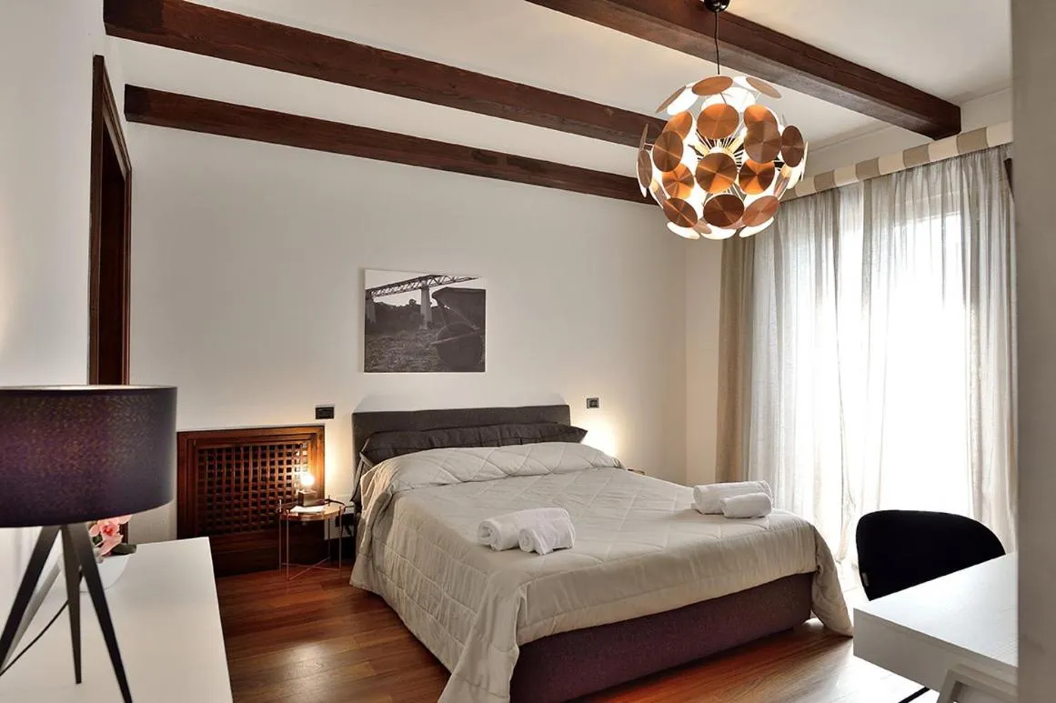 Photo of the whole room, Bed in Casa Realia