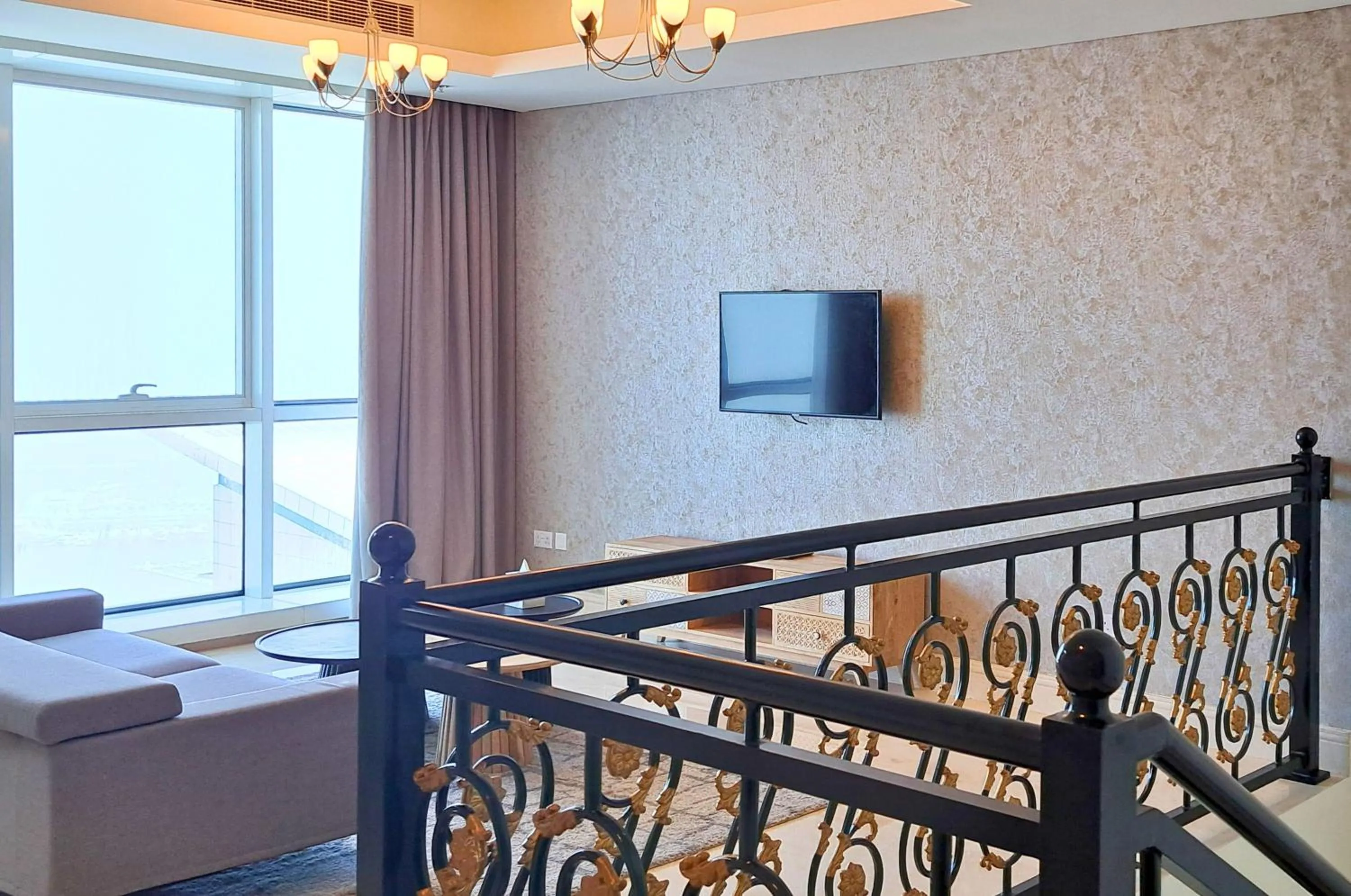 Living room, Bed in Barceló Residences Dubai Marina