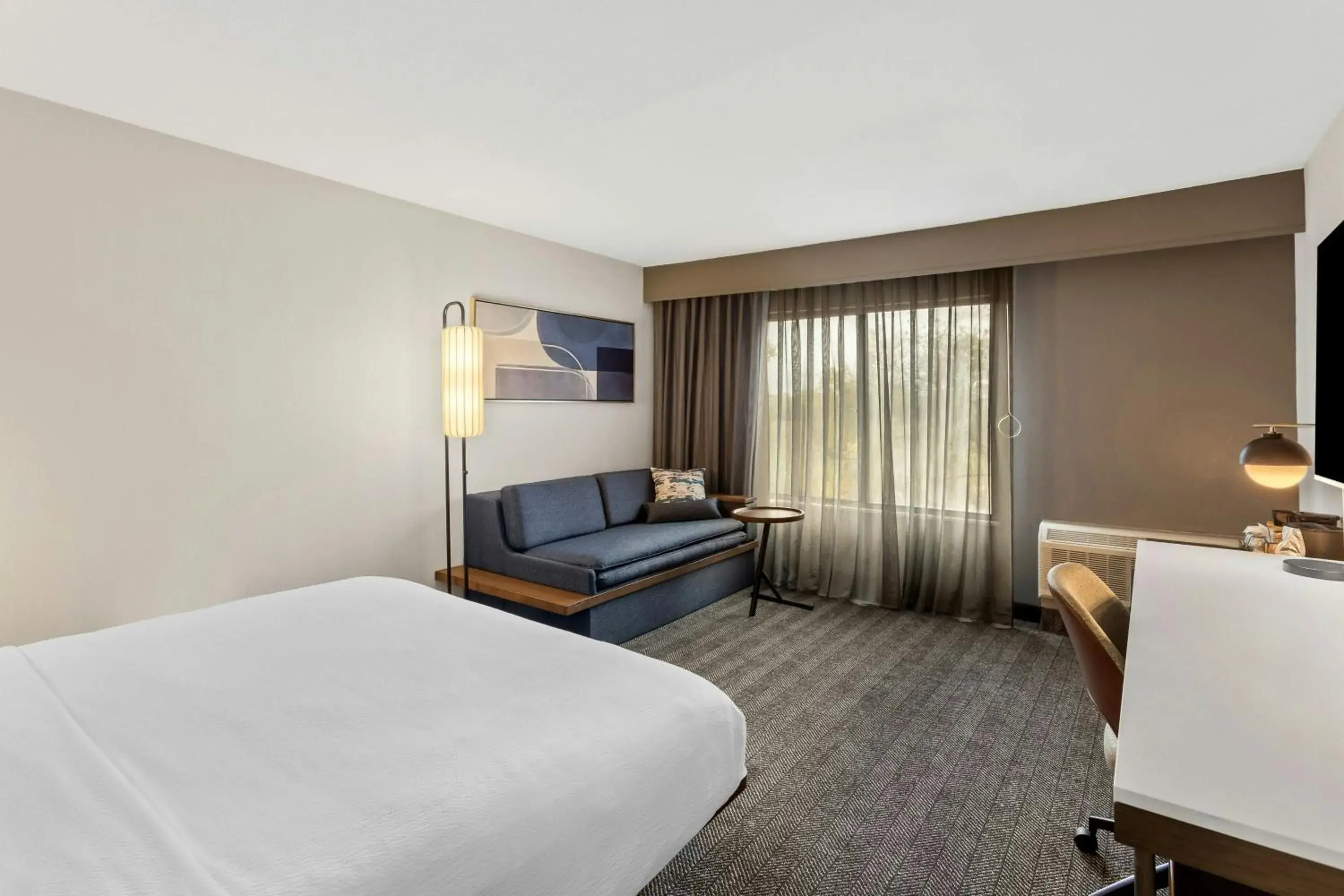 King Room with Sofa Bed and Adapted Tub - Mobility and Hearing Accessible in Courtyard Chicago Southeast/Hammond, Indiana King Room with Sofa Bed and Adapted Tub - Mobility and Hearing Accessible in Courtyard Chicago Southeast/Hammond, Indiana