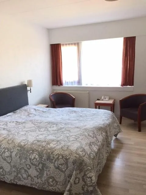 Bed in Hotel Laasby Kro