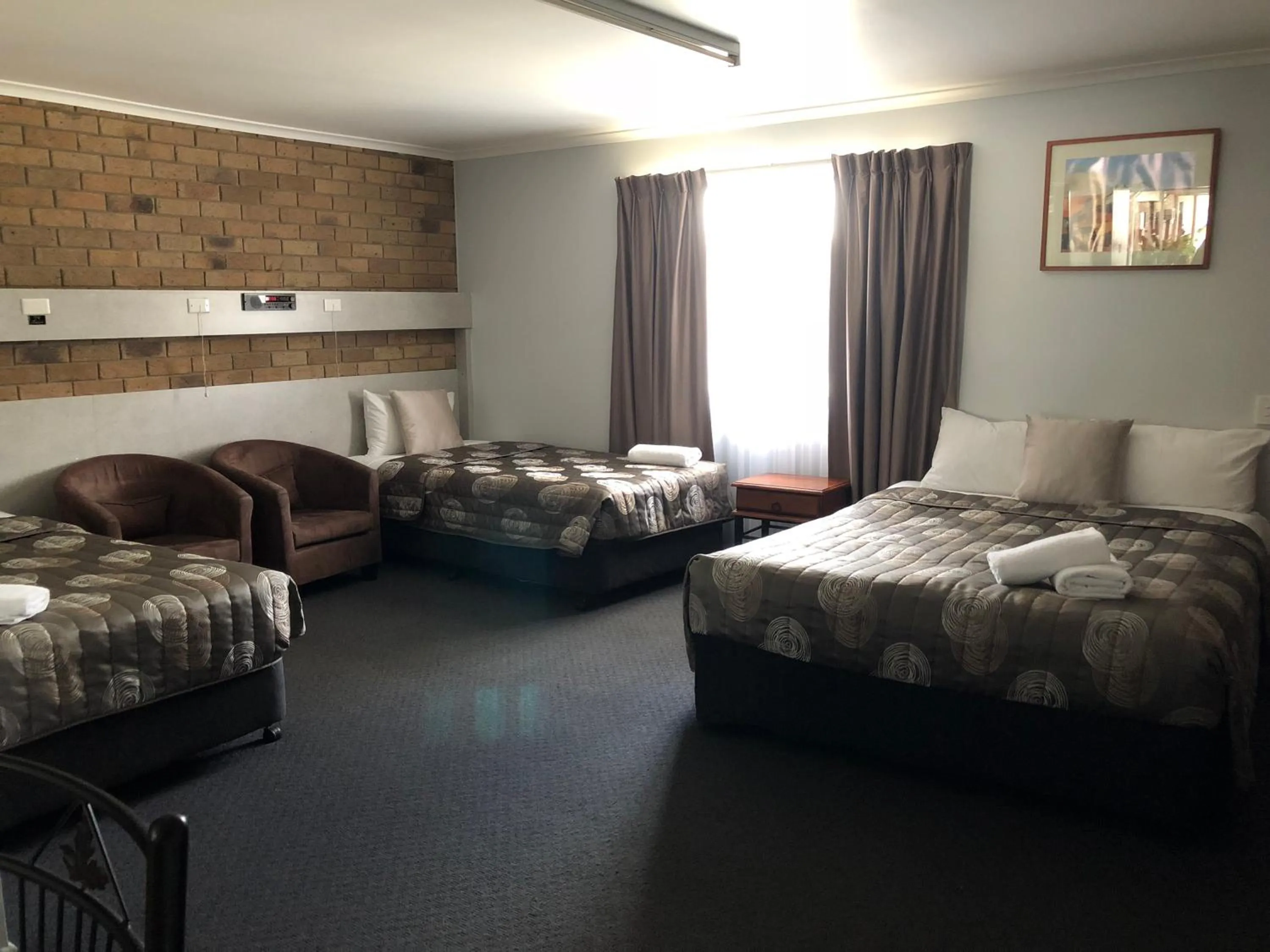 Bed in True Blue Motor Inn