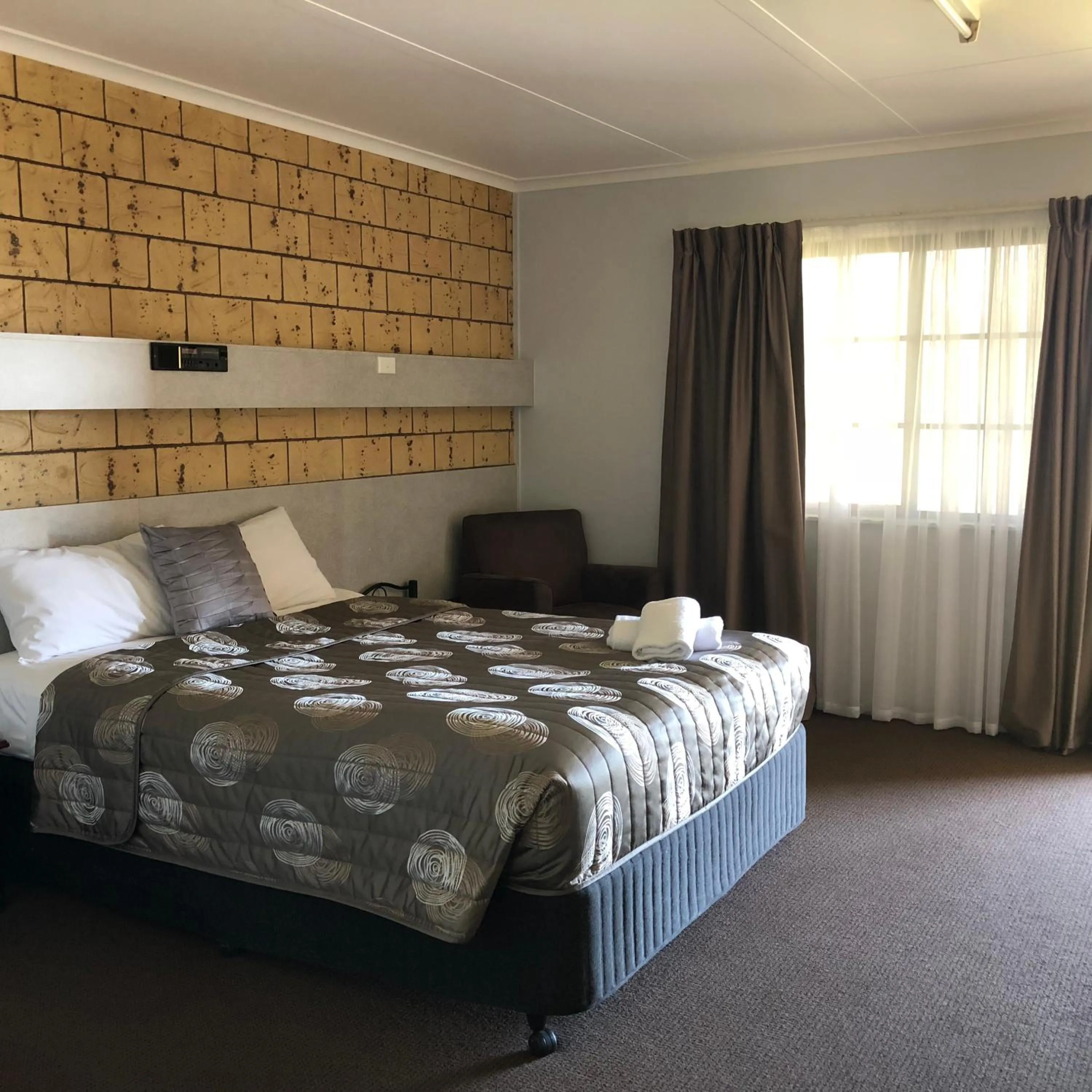 Bed in True Blue Motor Inn