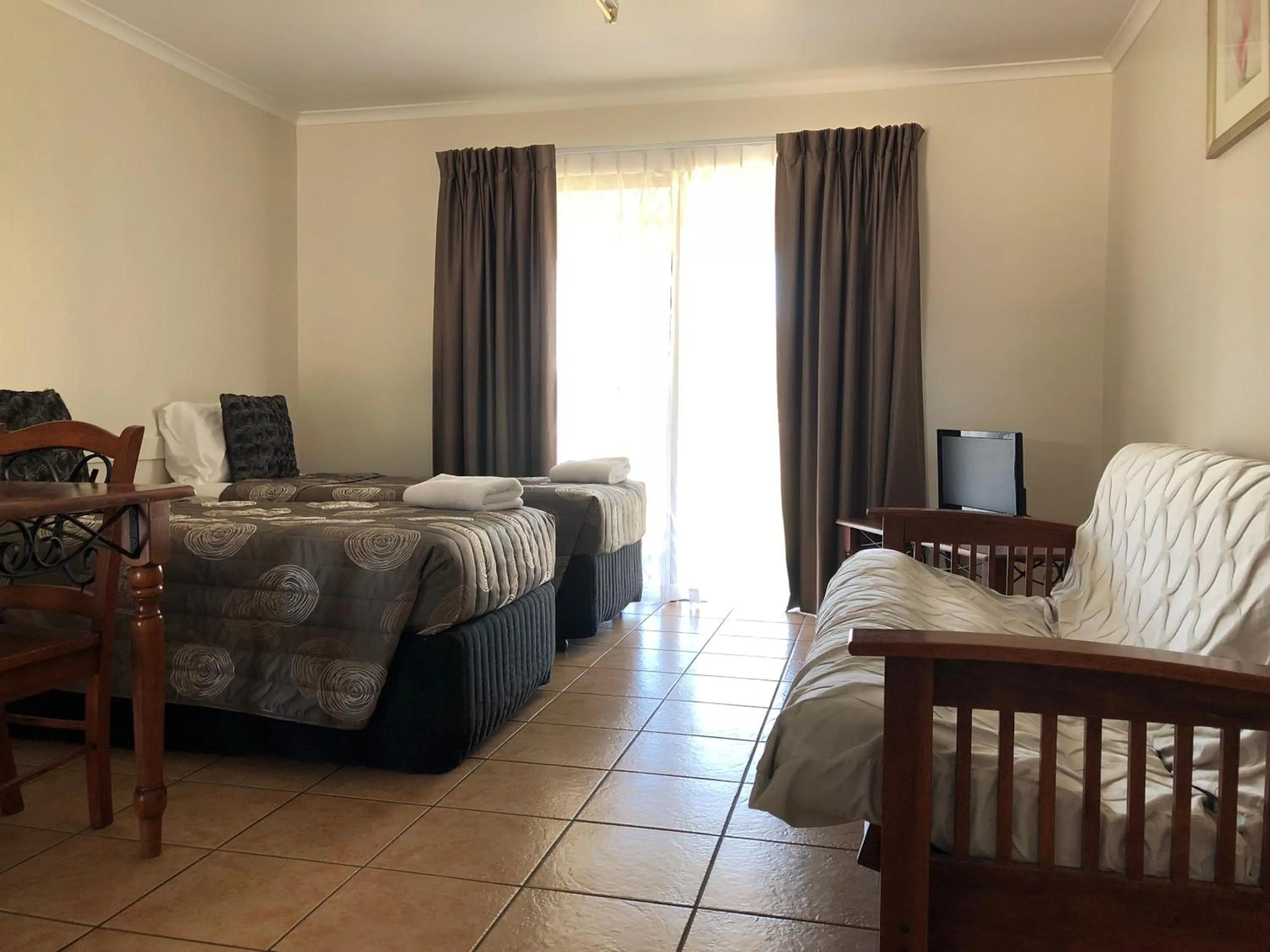 Bed in True Blue Motor Inn