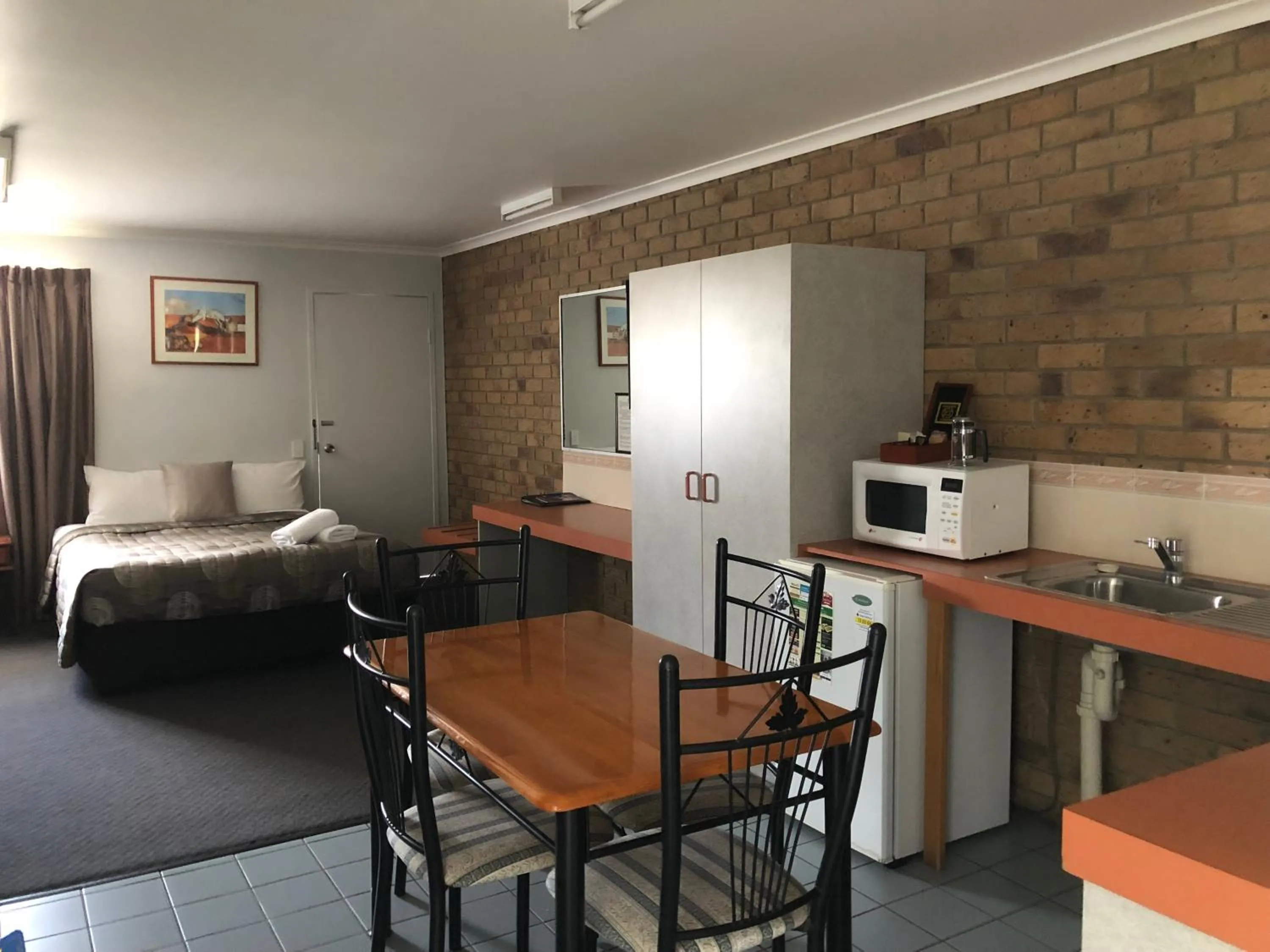 Bed in True Blue Motor Inn