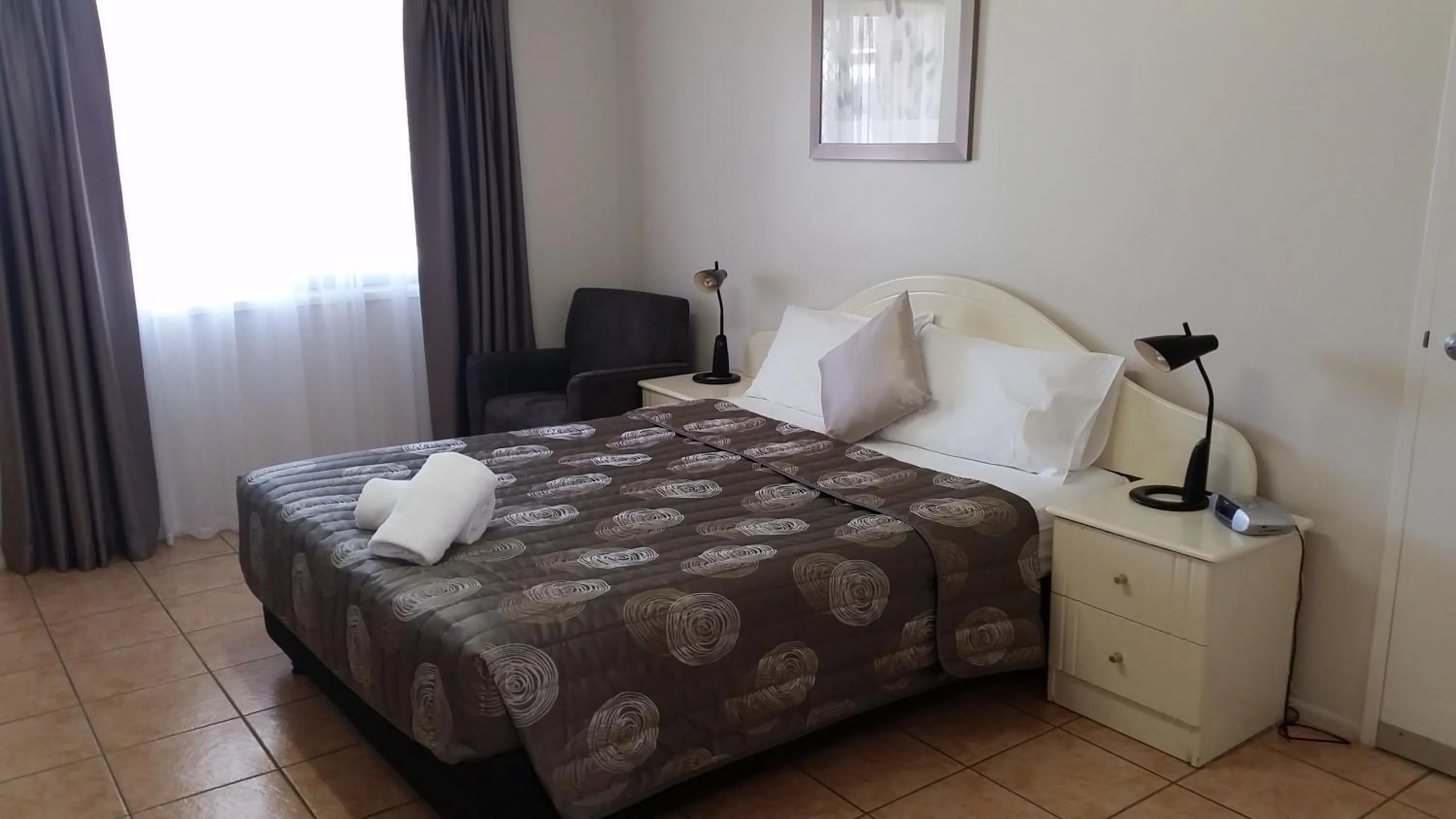 Bed in True Blue Motor Inn