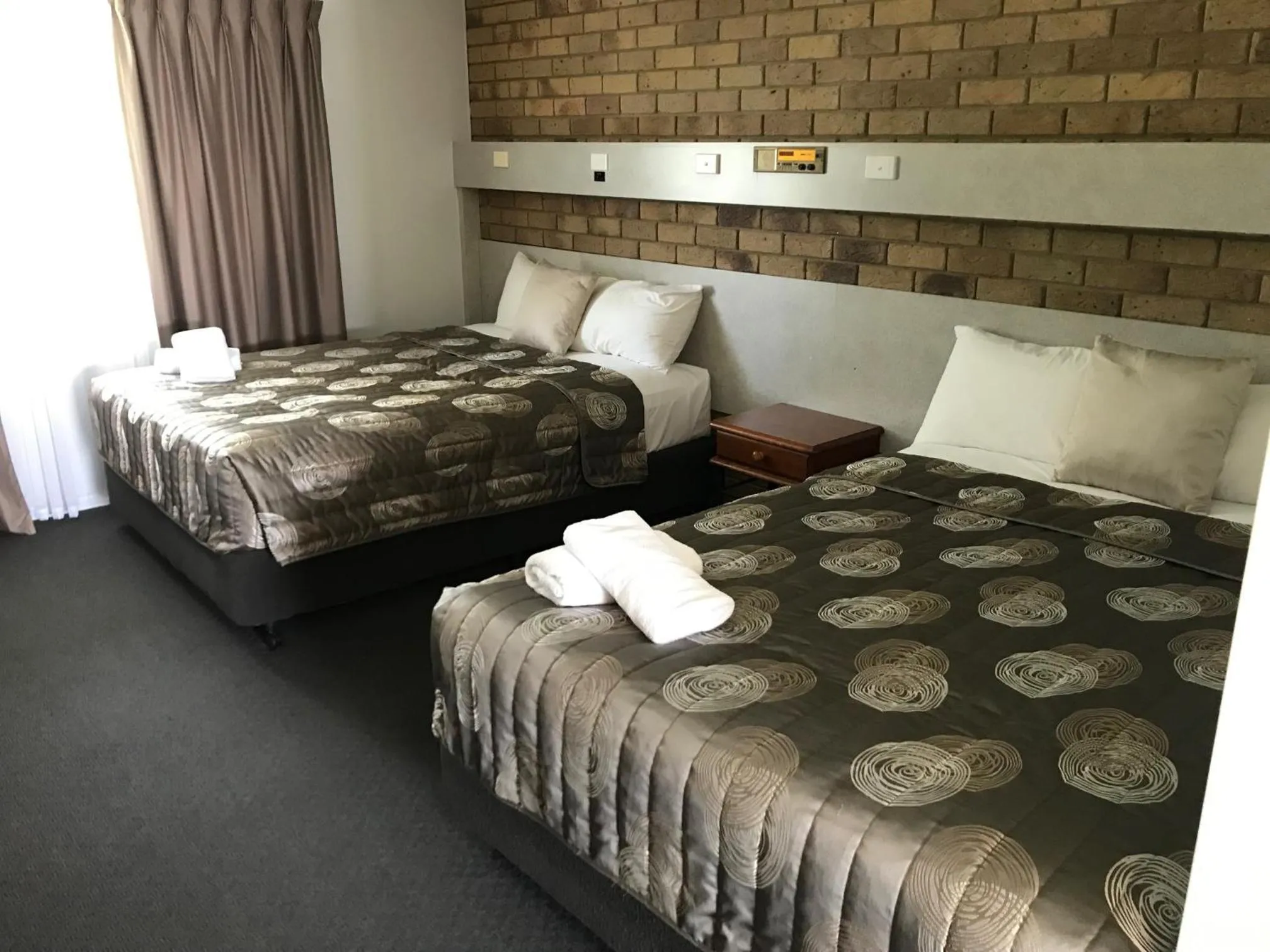 Bed in True Blue Motor Inn