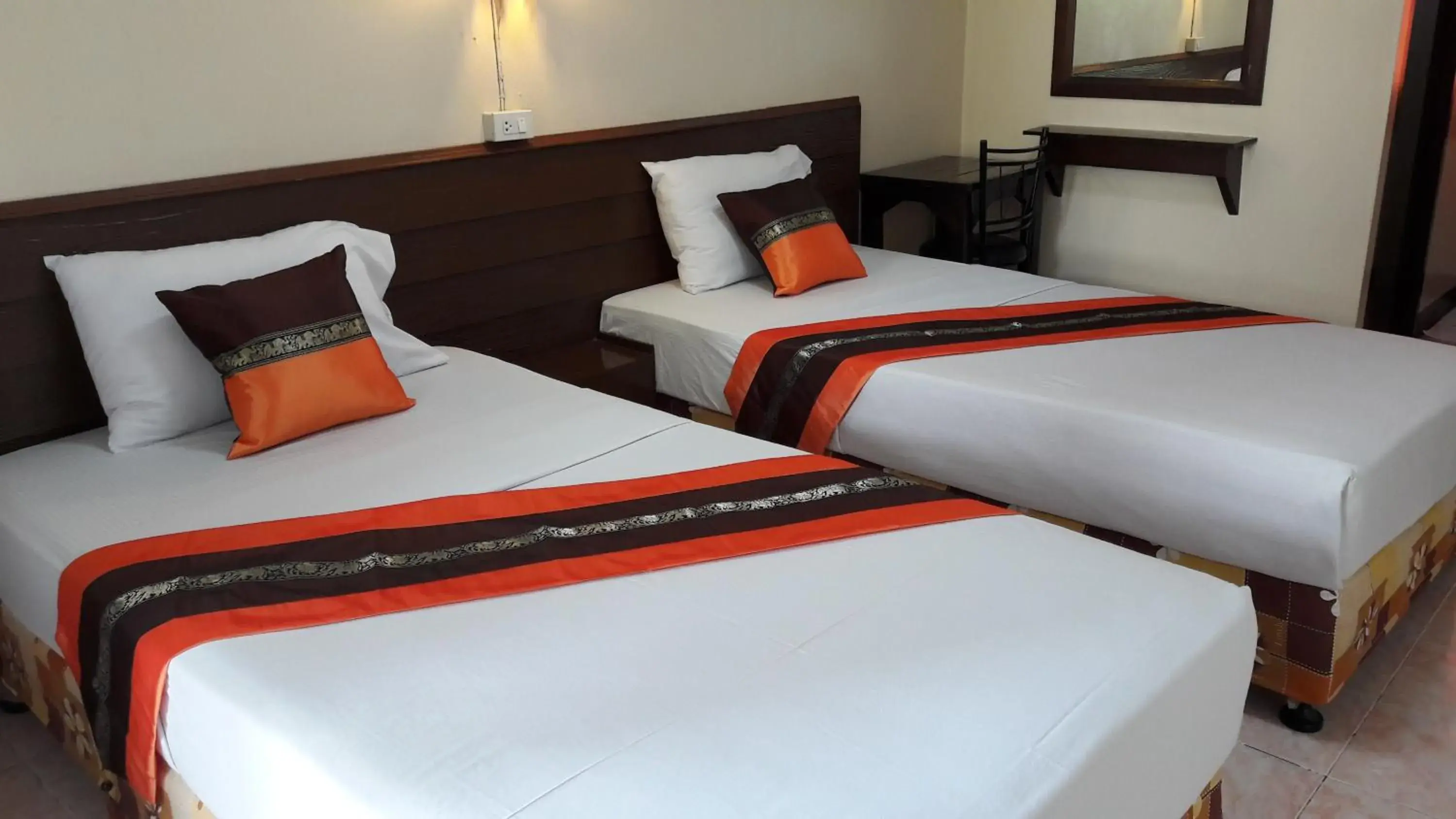 Bed in Lanna Thai Guesthouse Bed in Lanna Thai Guesthouse