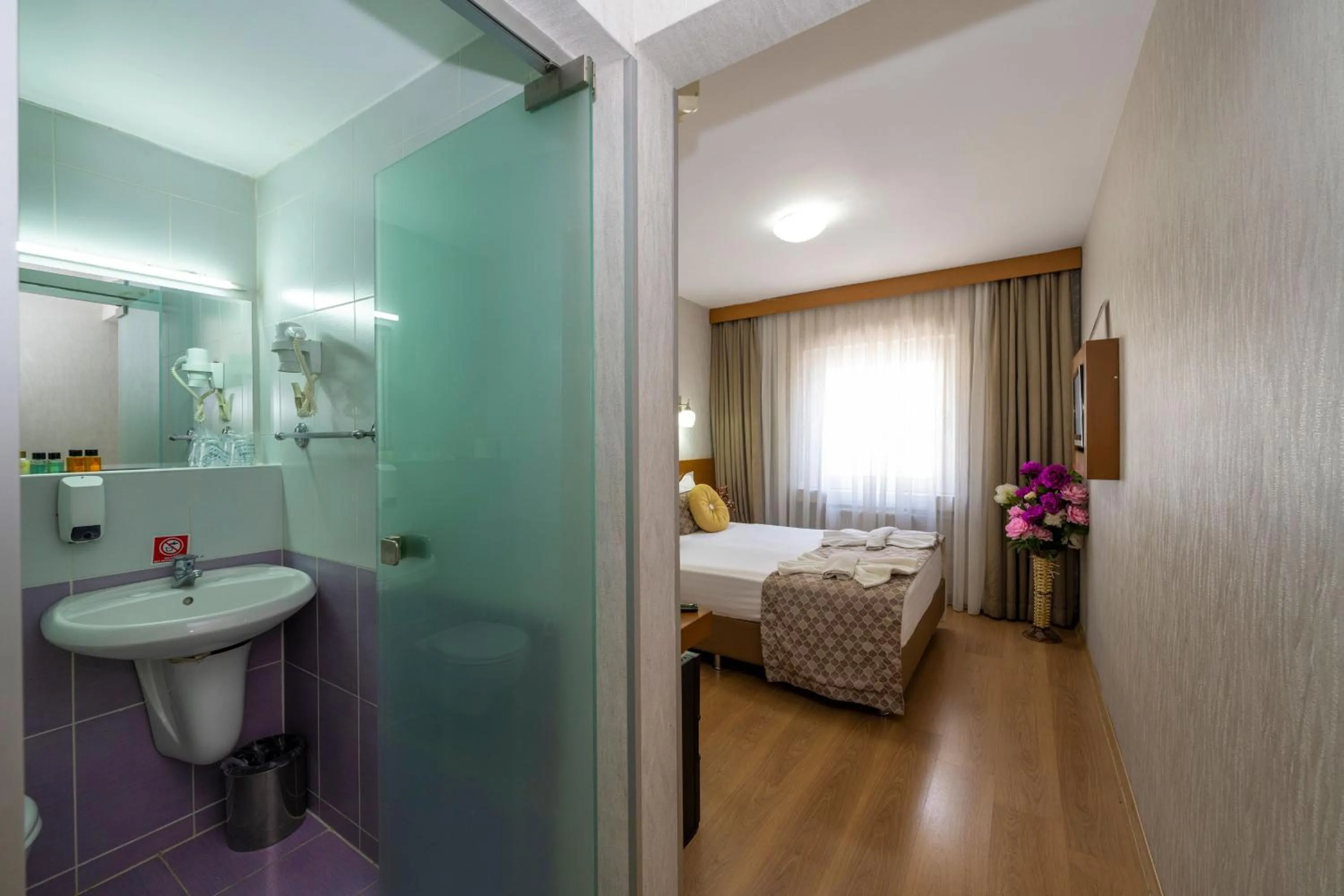 Bed in Grand Ons Hotel