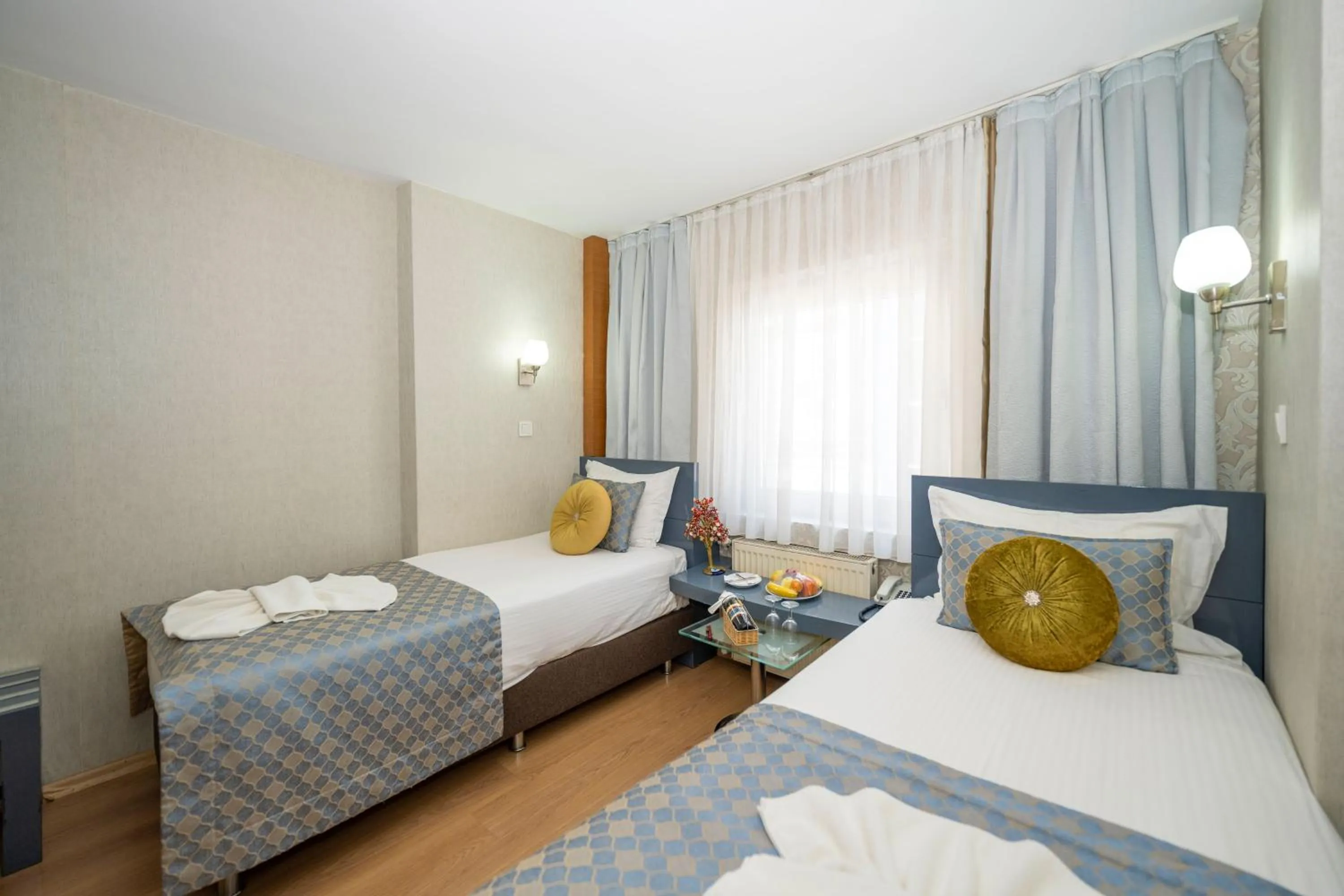 Bed in Grand Ons Hotel