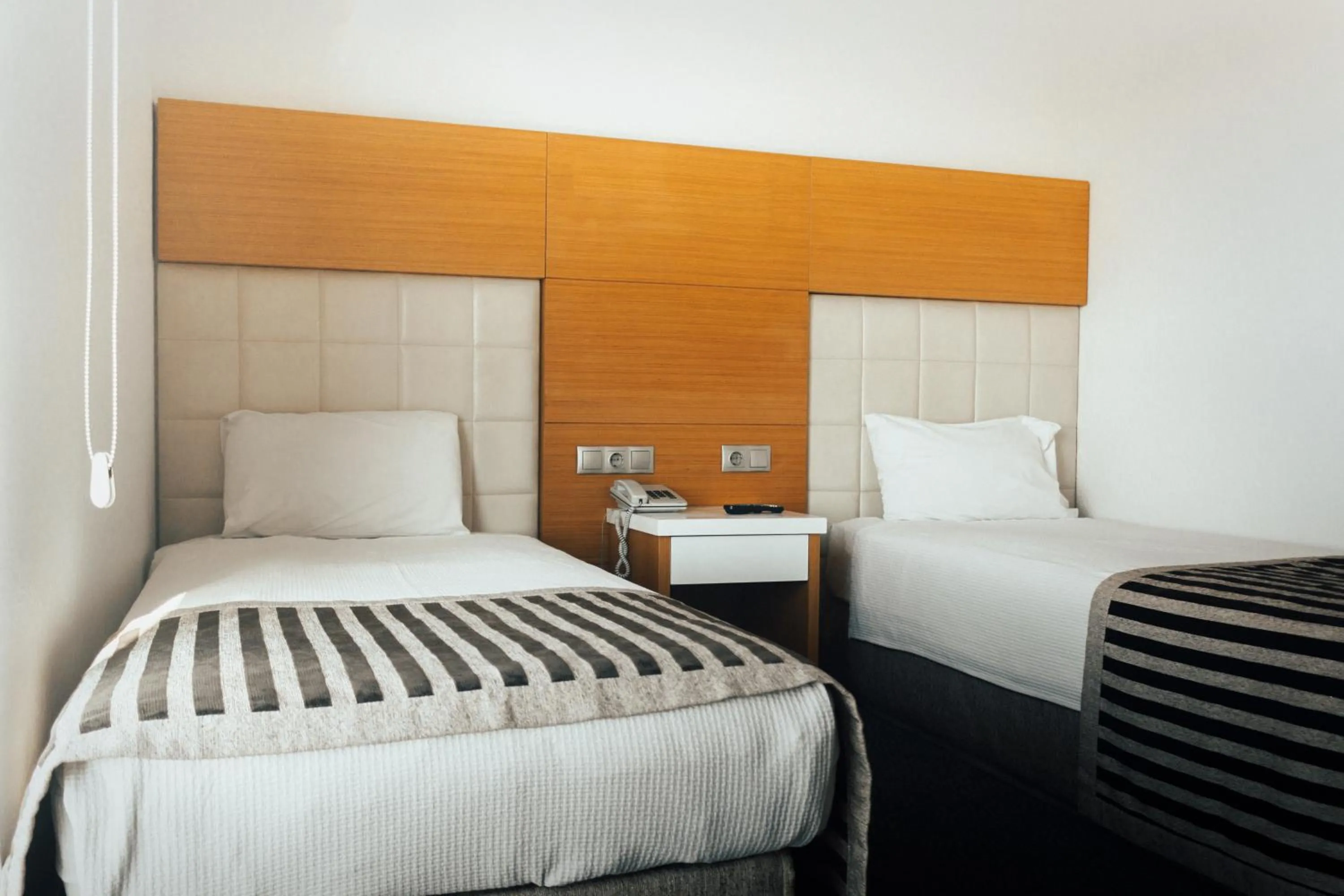 Bed in Nüzhet Hotel